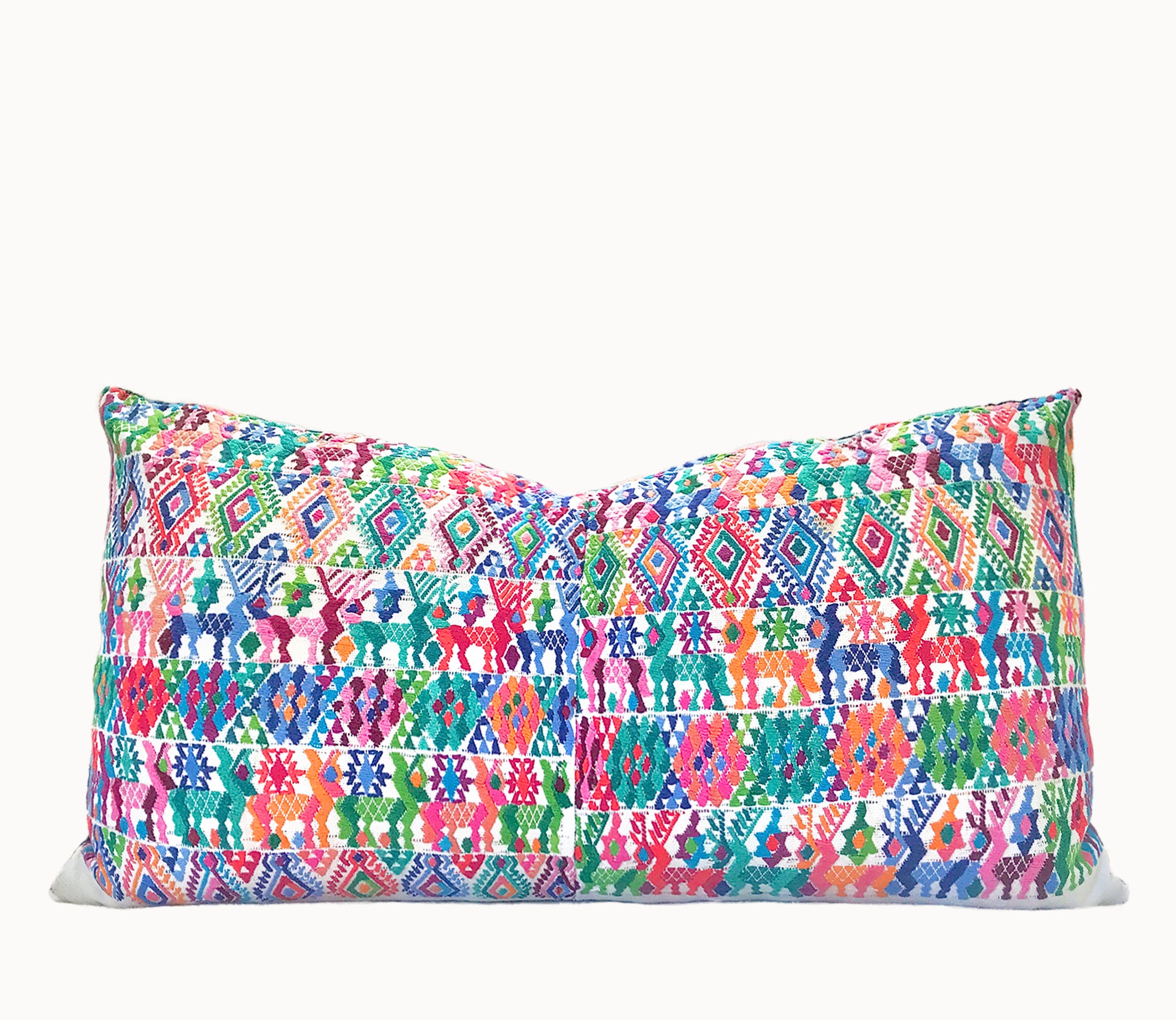 Vintage textile cushions made from a Guatemalan huipil and corte.
