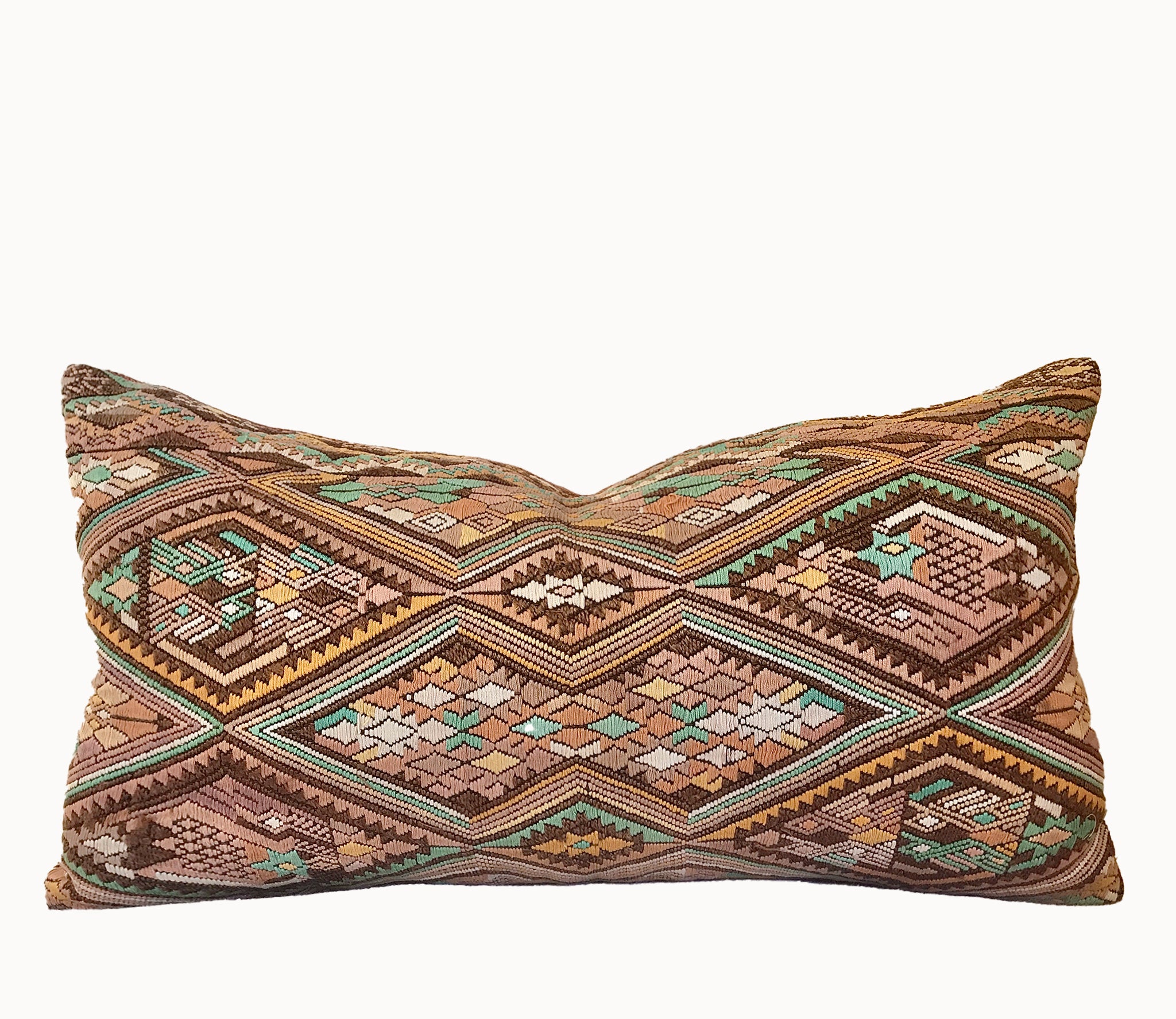 Embroidered Guatemalan huipil textile repurposed into a pillow