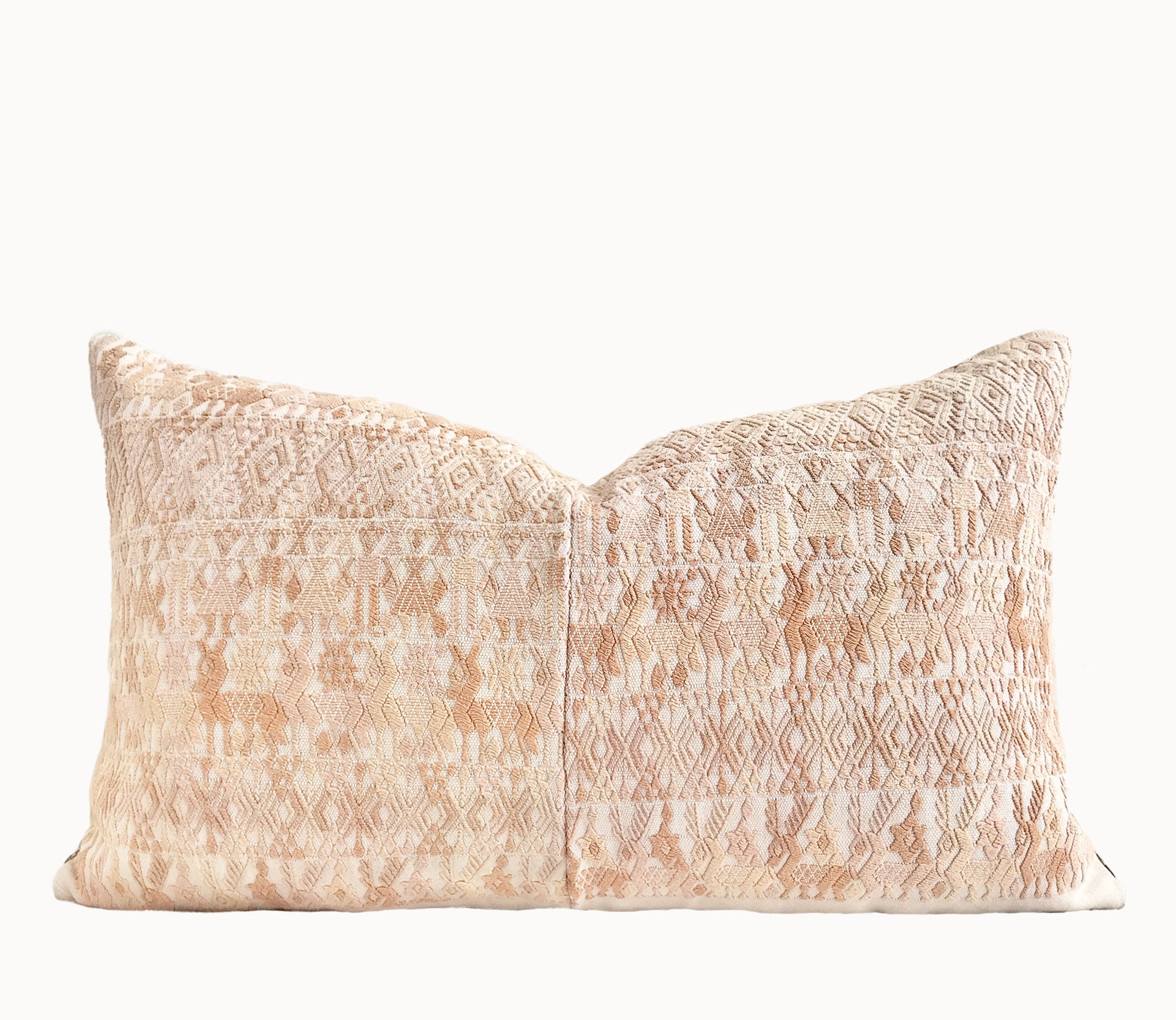 Vintage textile pillows made from a Guatemalan huipil and corte.