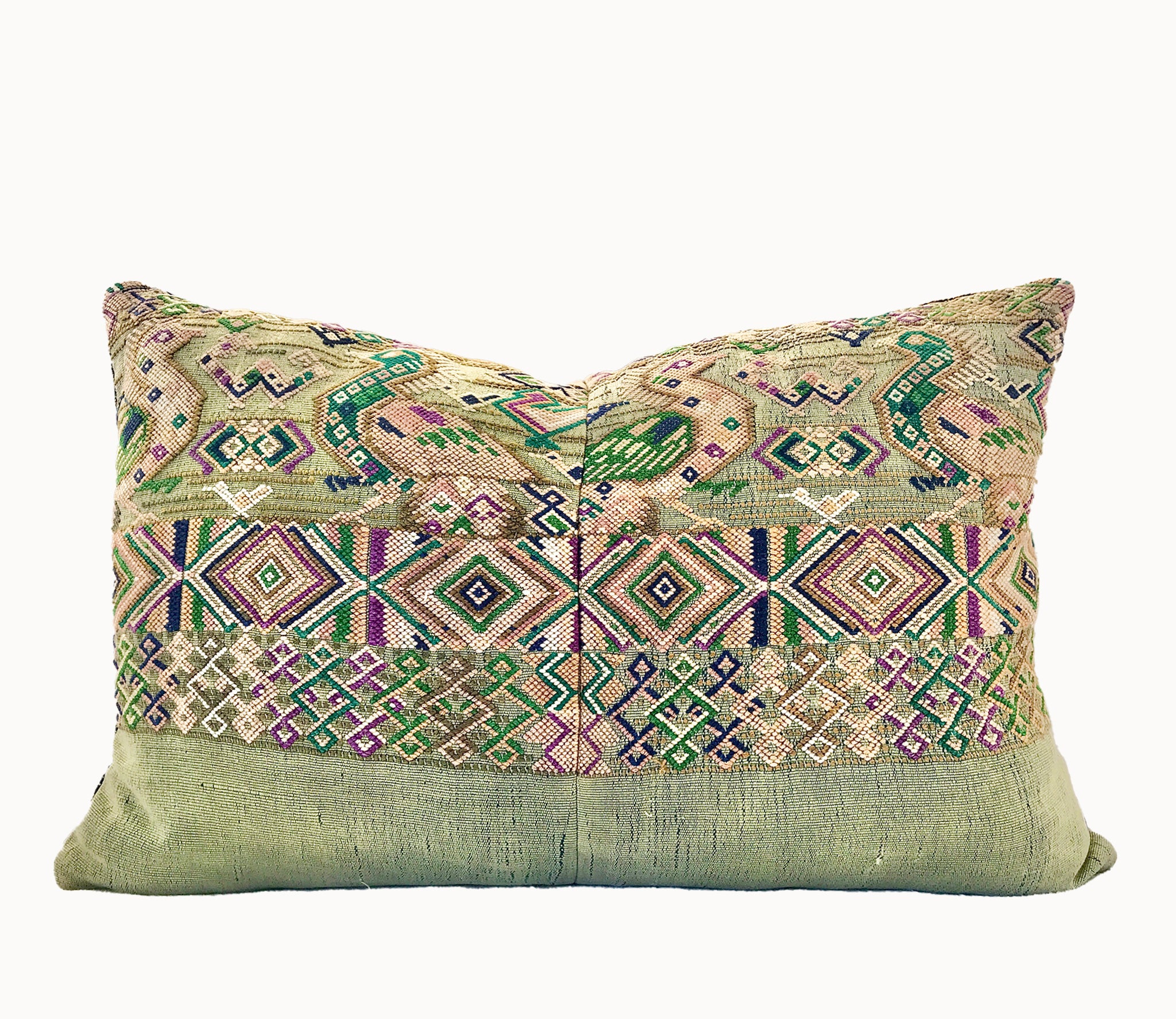 Vintage textile pillows made from a Guatemalan huipil and corte.