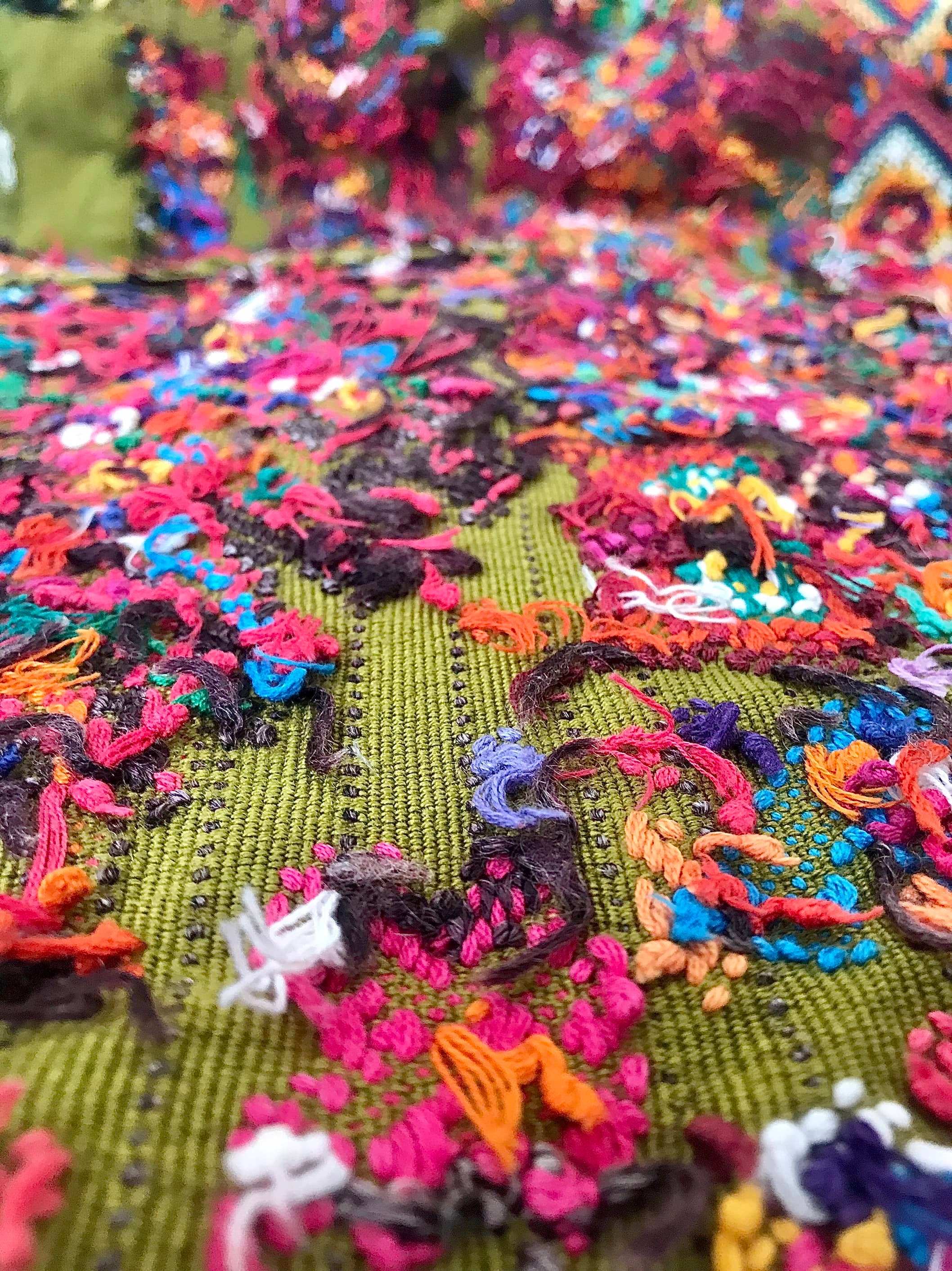 Guatemalan embroidered huipil pillow. Maximilist design of startled owls birds for bohemian decor.