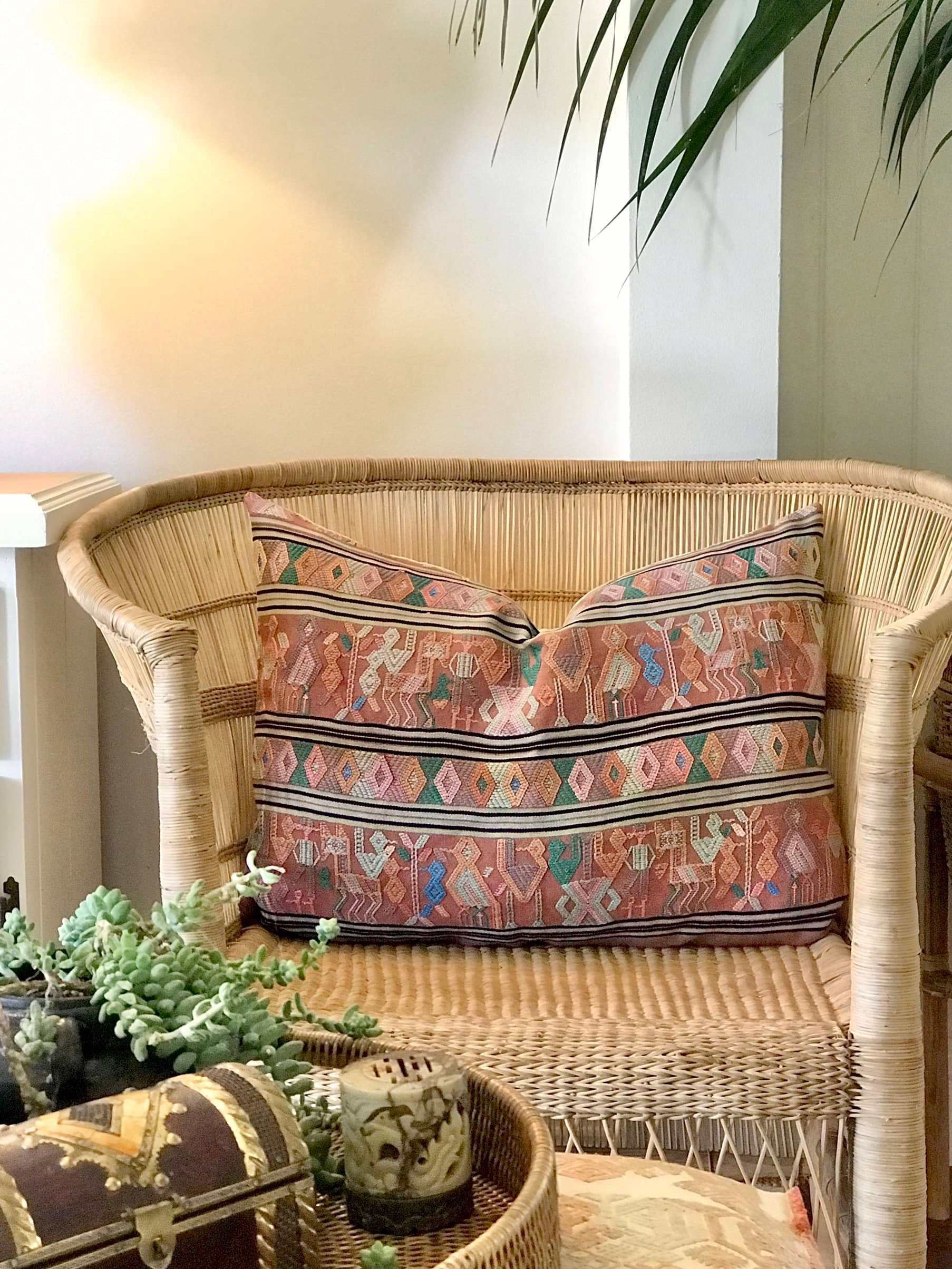 A Pair of Guatemalan Huipil Textile Pillows, vintage, hand embroidered striped tribal hieroglyphic design in aged coral