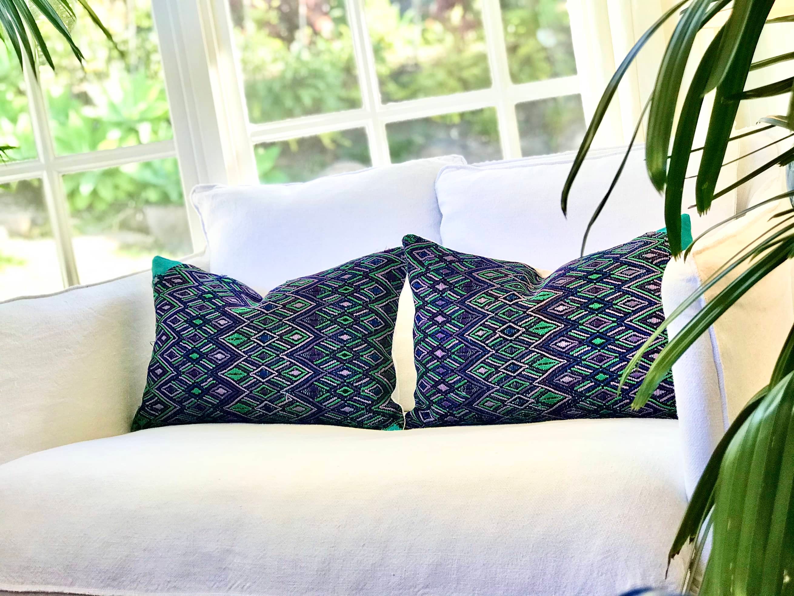 Guatemalan embroidered huipil pillow. Geometric pattern in bold tropical colours for bohemian decor