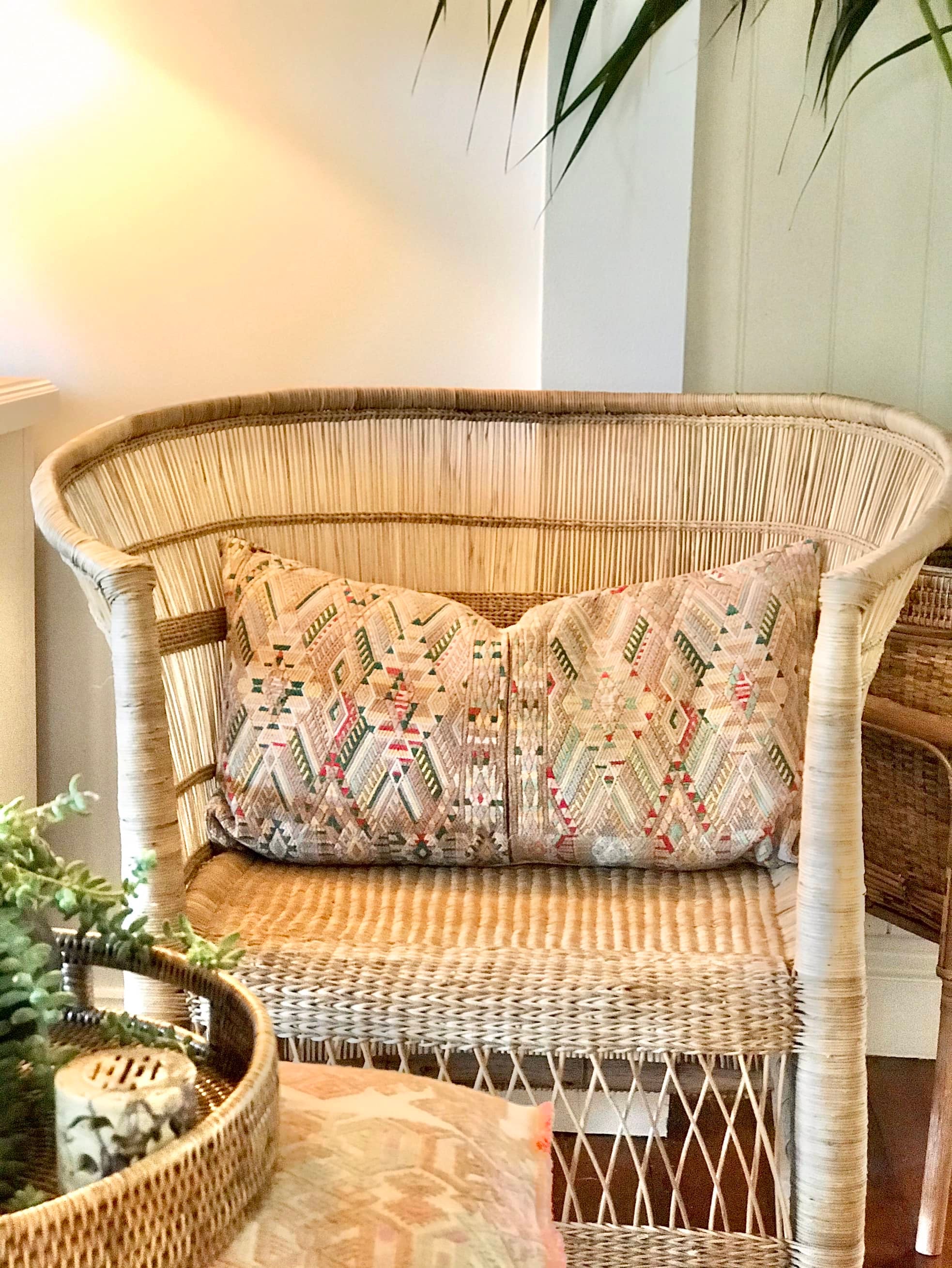 Guatemalan embroidered huipil pillow. Geometric chevron pattern in beige.