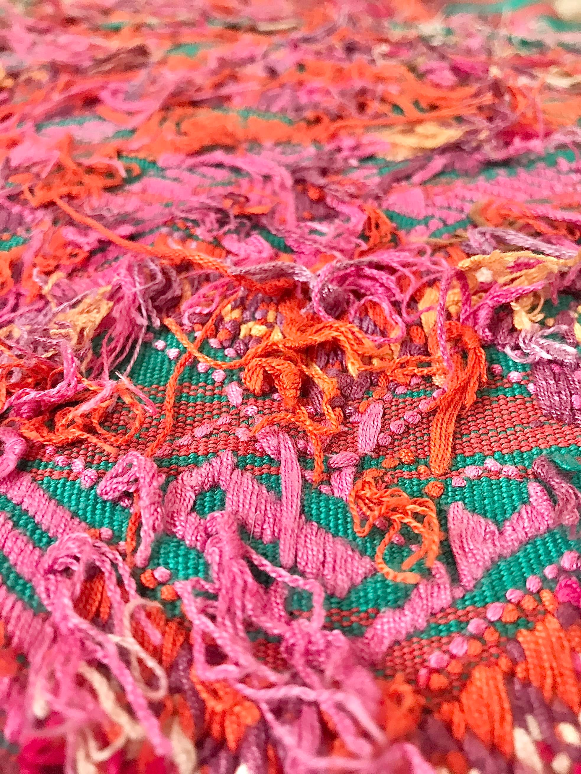 Guatemalan embroidered huipil pillow. Stylised horses on striped pink and green. Perfect for the nursery or a little girls bedroom.