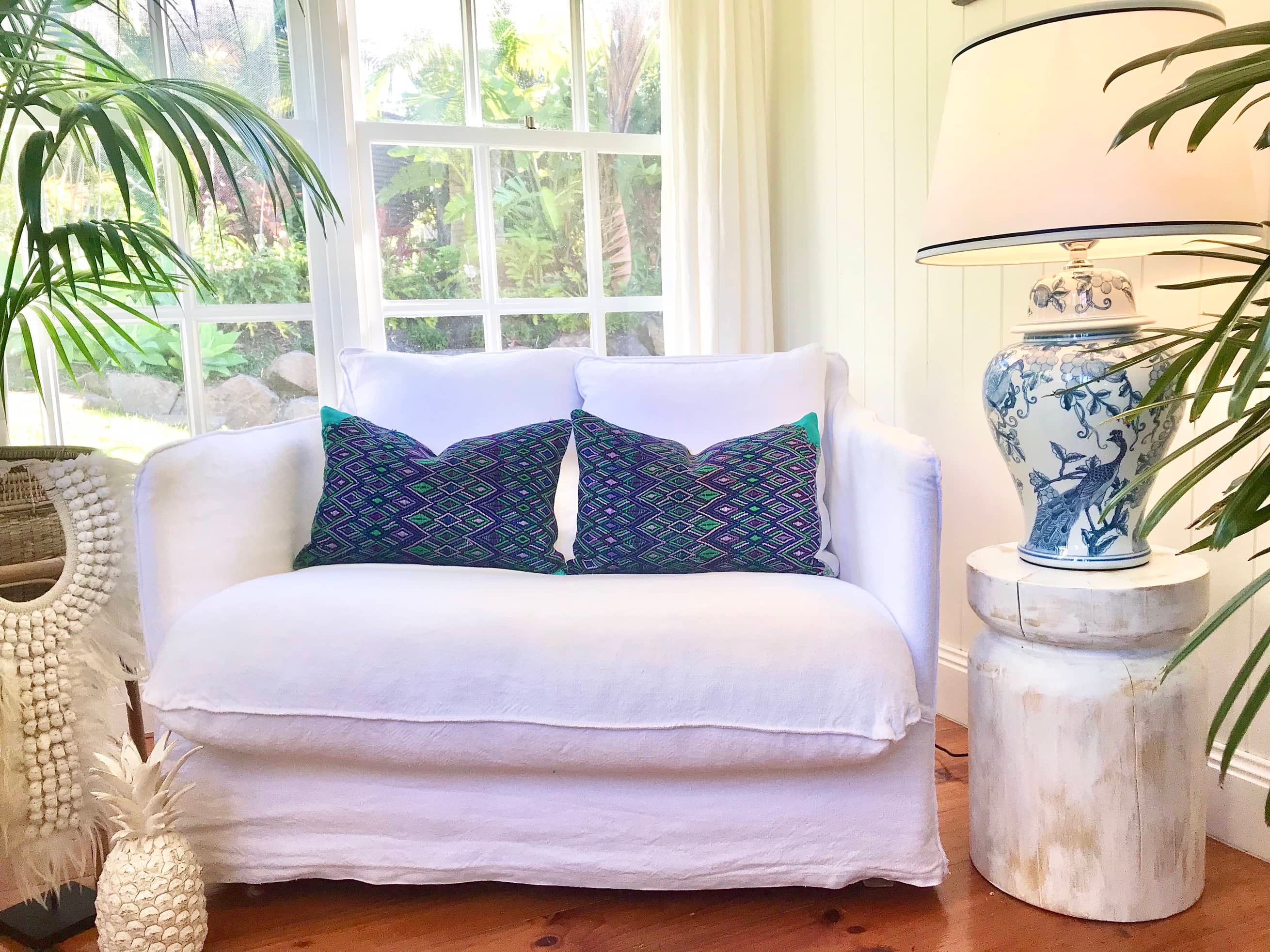 Guatemalan embroidered huipil pillow. Geometric pattern in bold tropical colours for bohemian decor