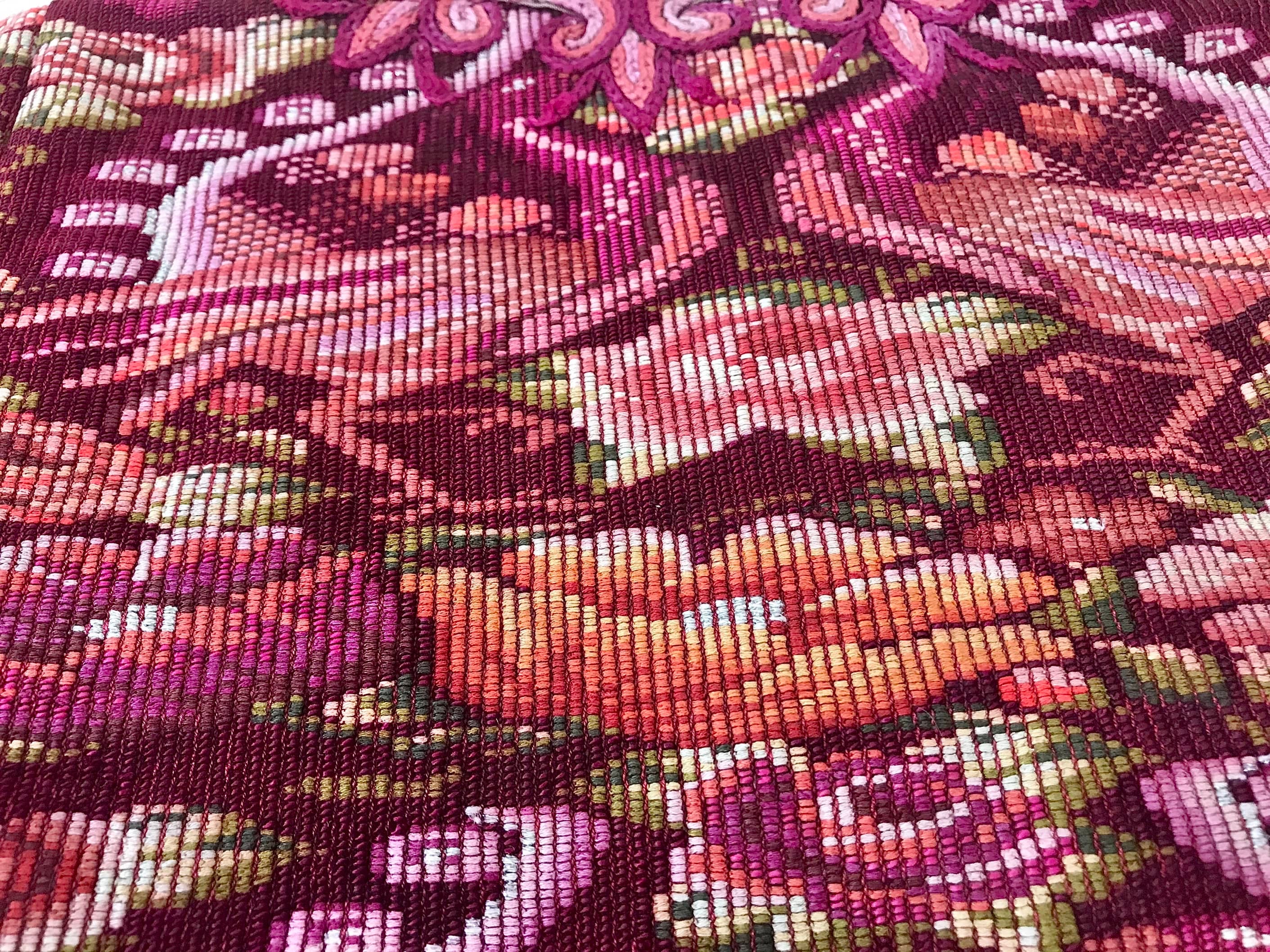 Guatemalan embroidered huipil pillow. Maximilist design of flowers and peacocks in rich burgundy red.