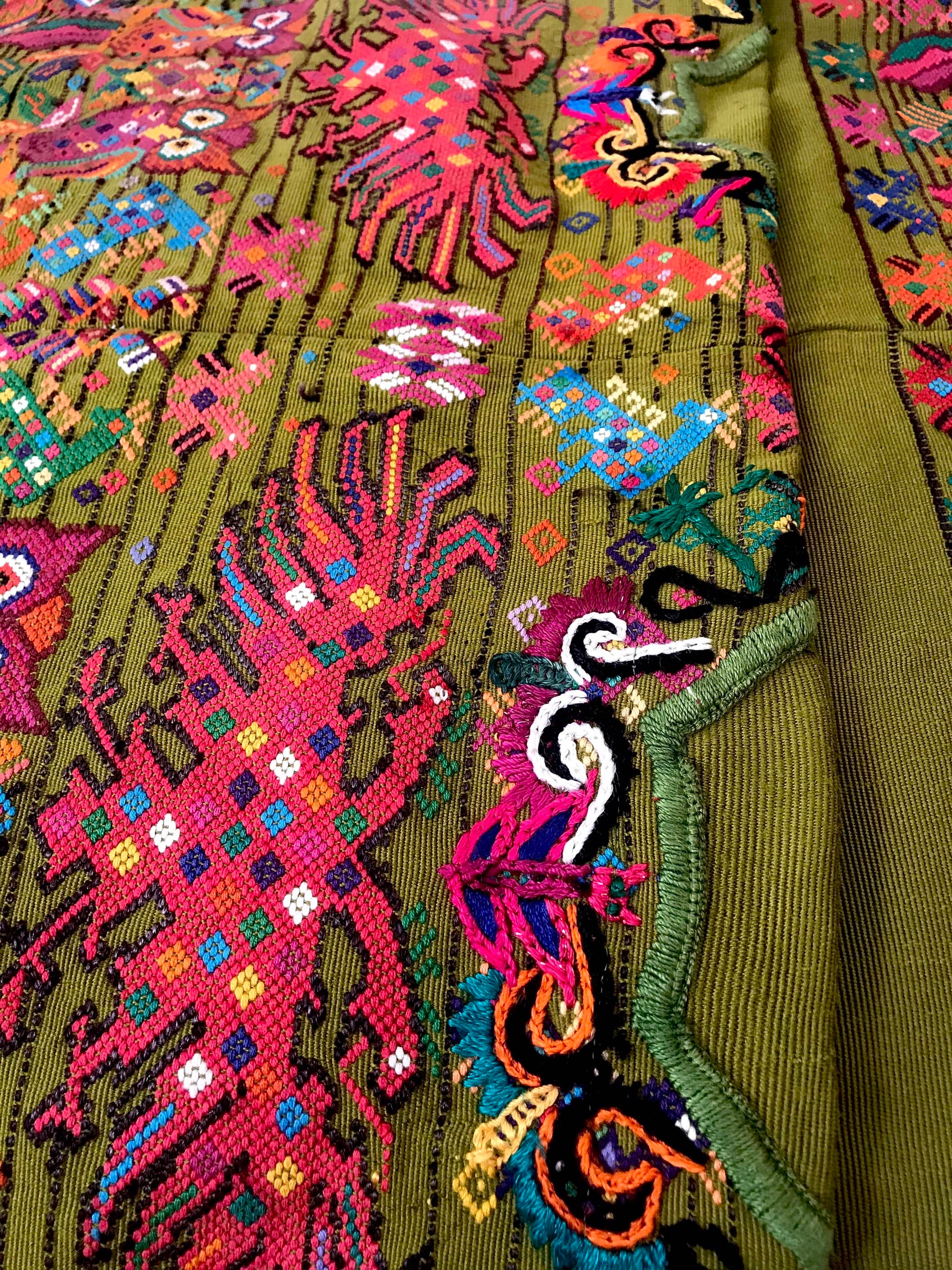 Guatemalan embroidered huipil pillow. Maximilist design of startled owls birds for bohemian decor.