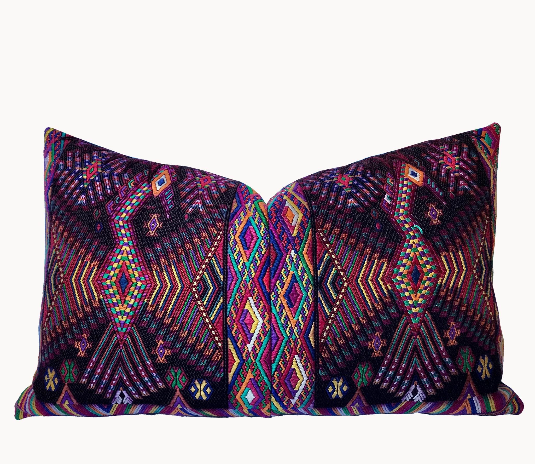 Guatemalan huipil pillow. A darkly exotic vintage textile with a stylised rising phoenix bird design.