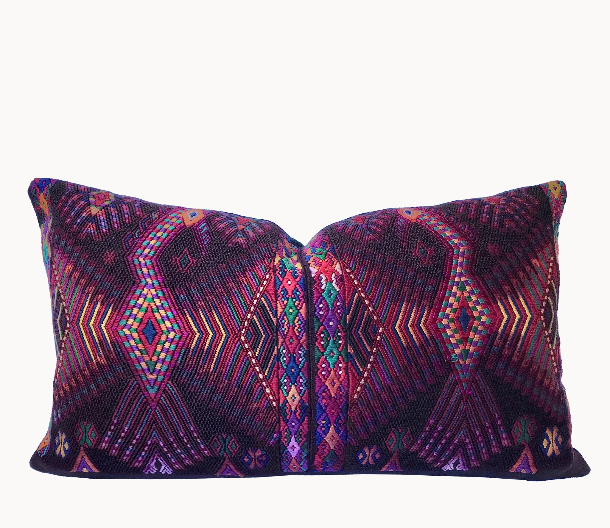 Guatemalan huipil pillow. A darkly exotic vintage textile with a stylised rising phoenix bird design.