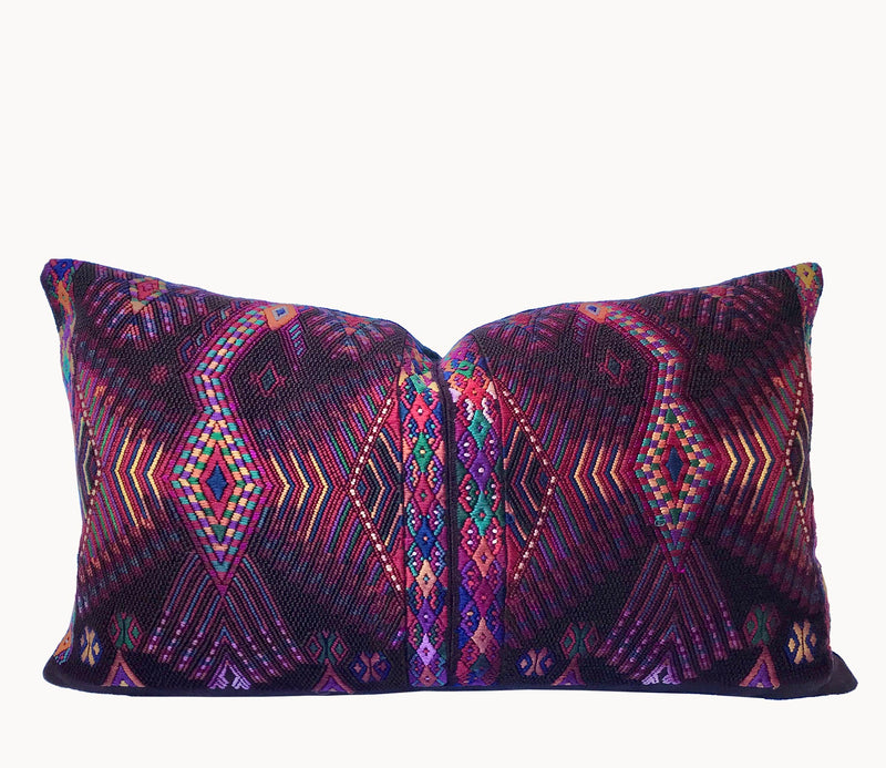 Guatemalan huipil pillow. A darkly exotic vintage textile with a stylised rising phoenix bird design.