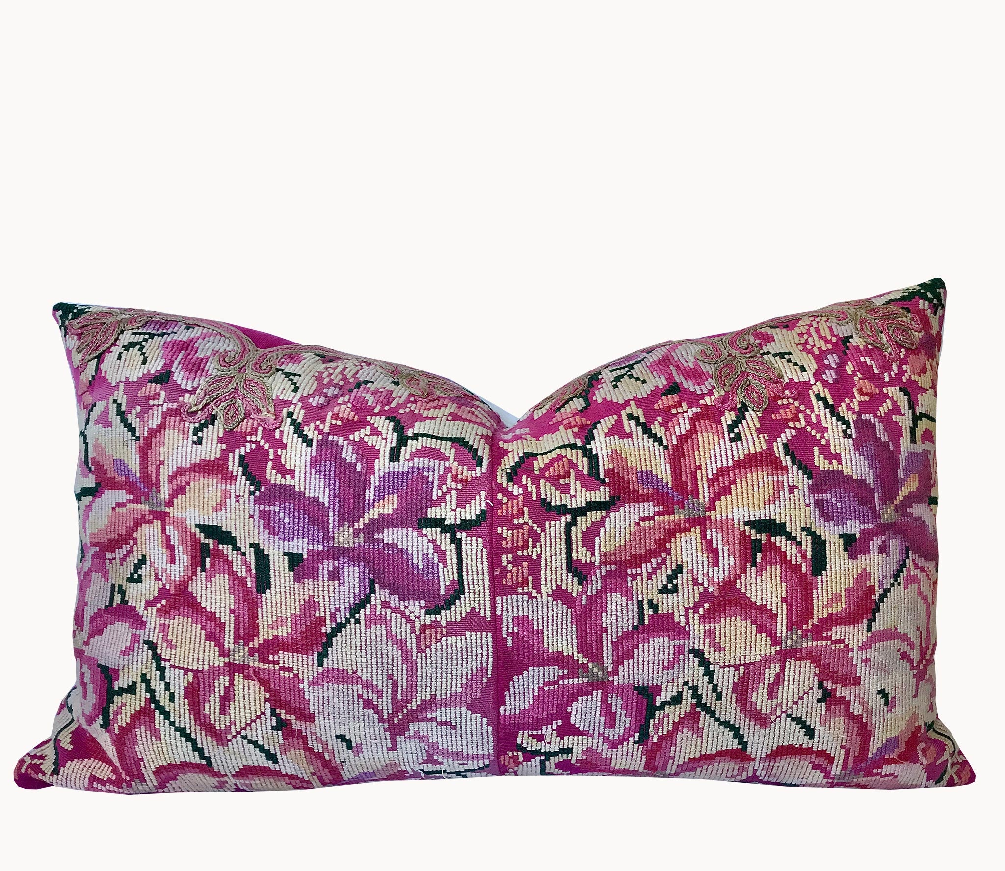 Guatemalan embroidered huipil pillow. A fuchsia vintage textile with an abstract floral design.