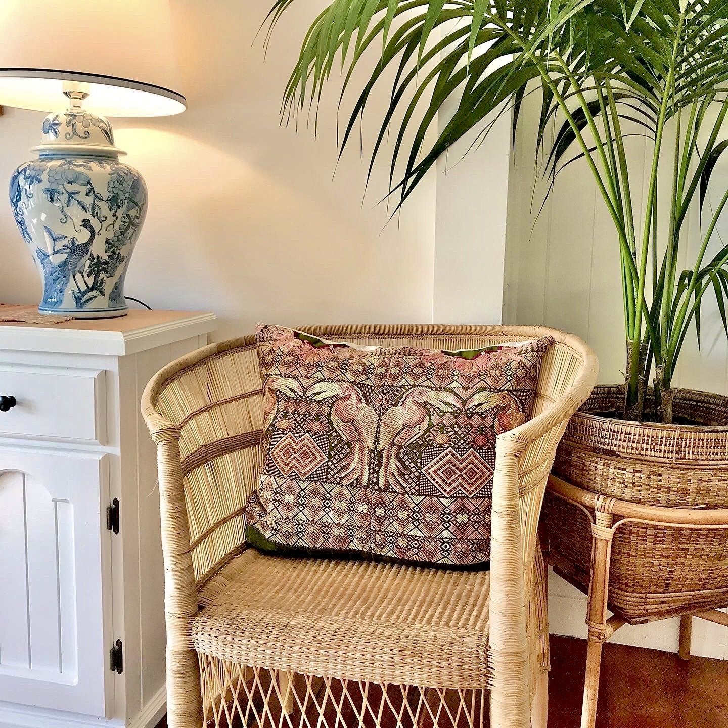 Guatemalan Huipil Textile Pillows, vintage, hand embroidered pair of toucan birds amidst geometric shapes