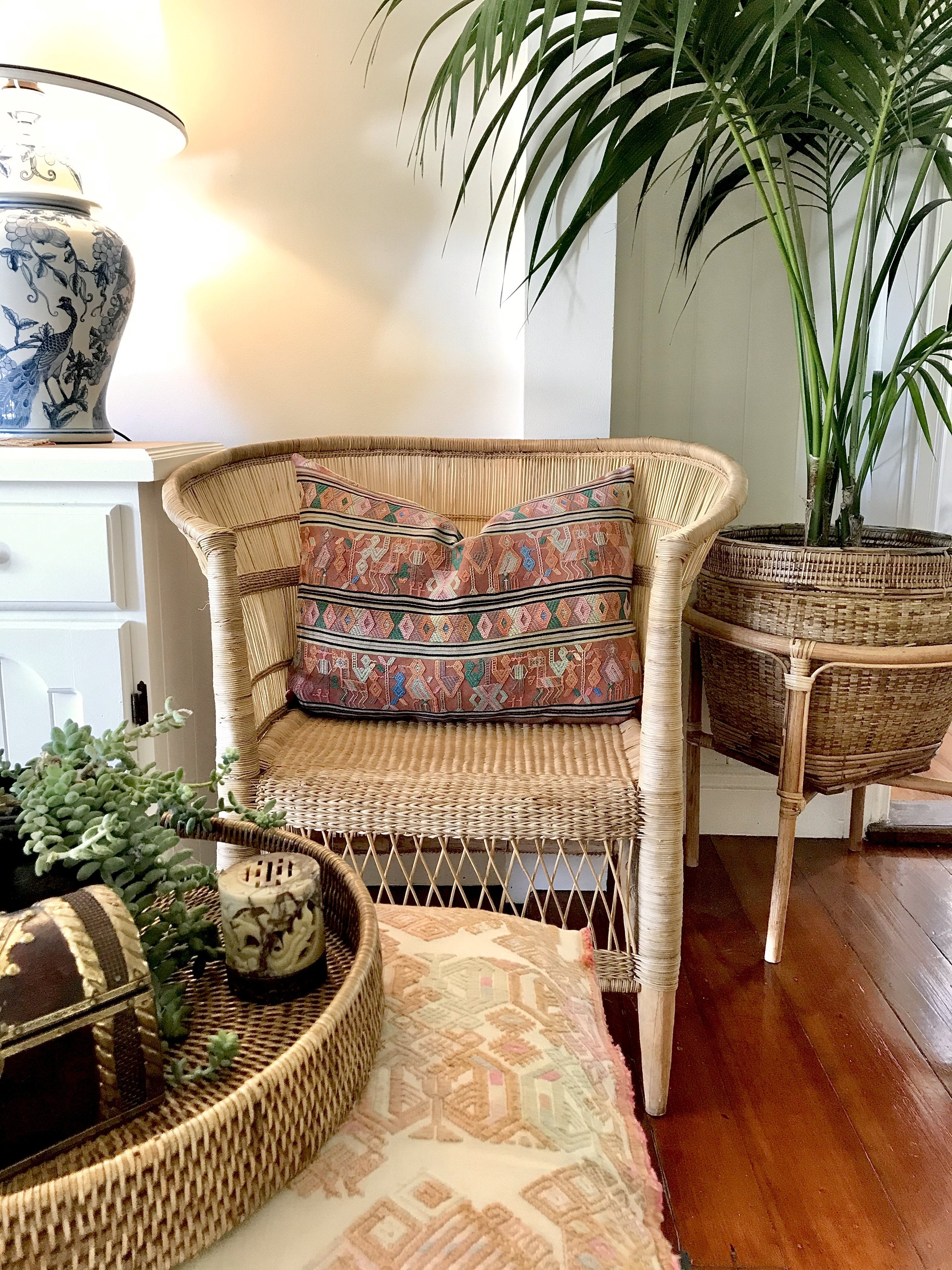 A Pair of Guatemalan Huipil Textile Pillows, vintage, hand embroidered striped tribal hieroglyphic design in aged coral