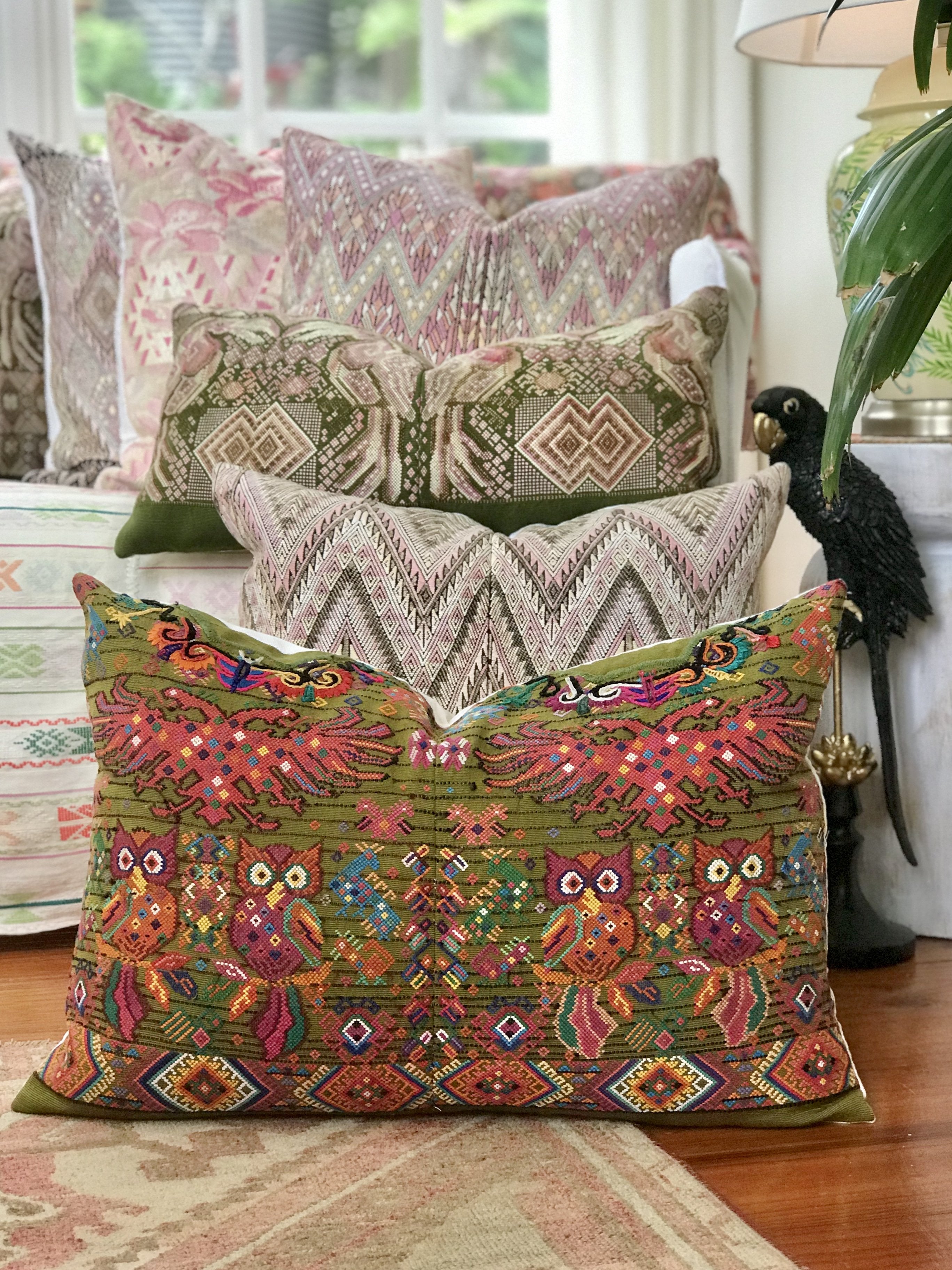 Guatemalan embroidered huipil pillow. Maximilist design of startled owls birds for bohemian decor.