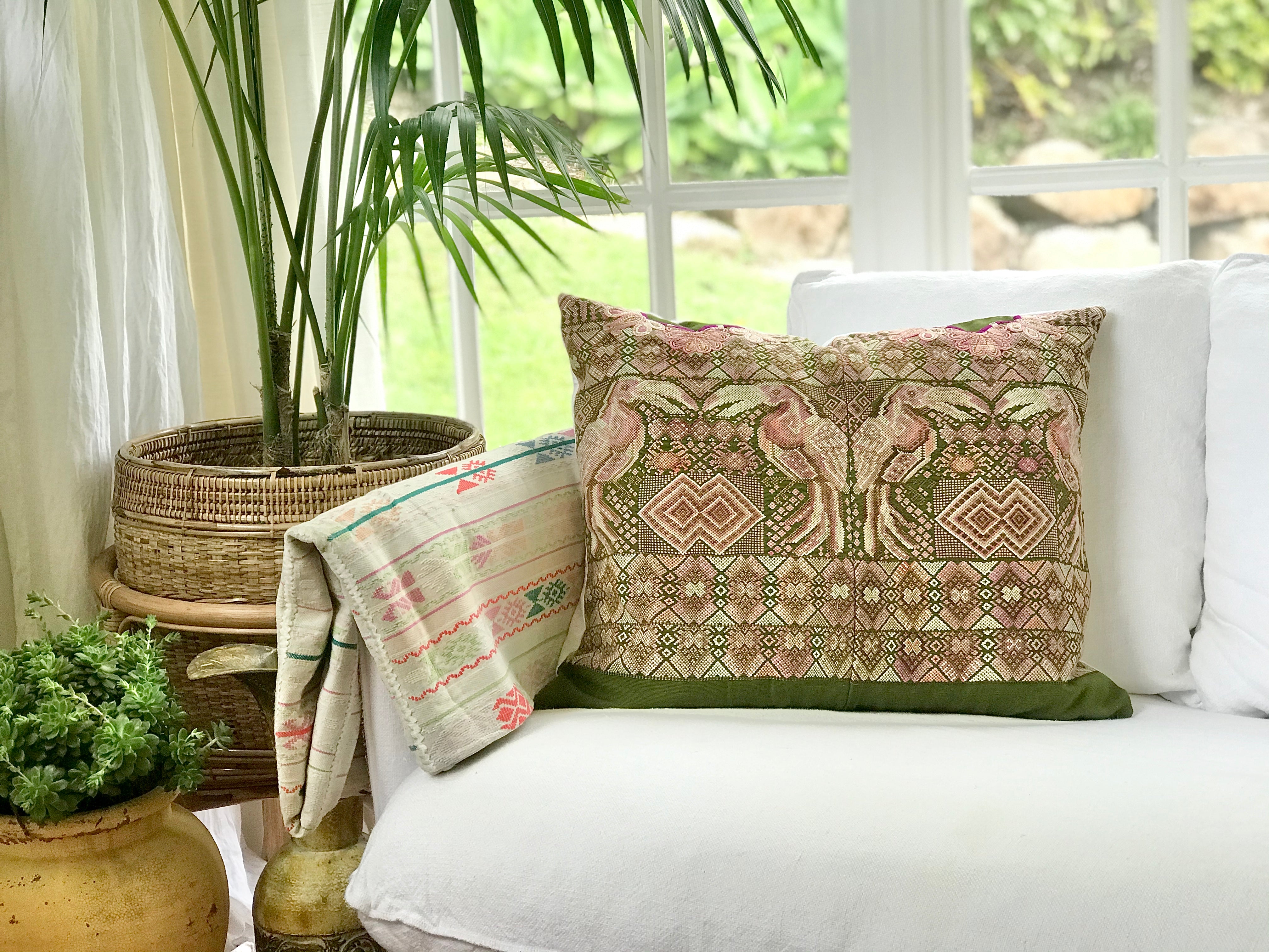 Guatemalan Huipil Textile Pillows, vintage, hand embroidered pair of toucan birds amidst geometric shapes