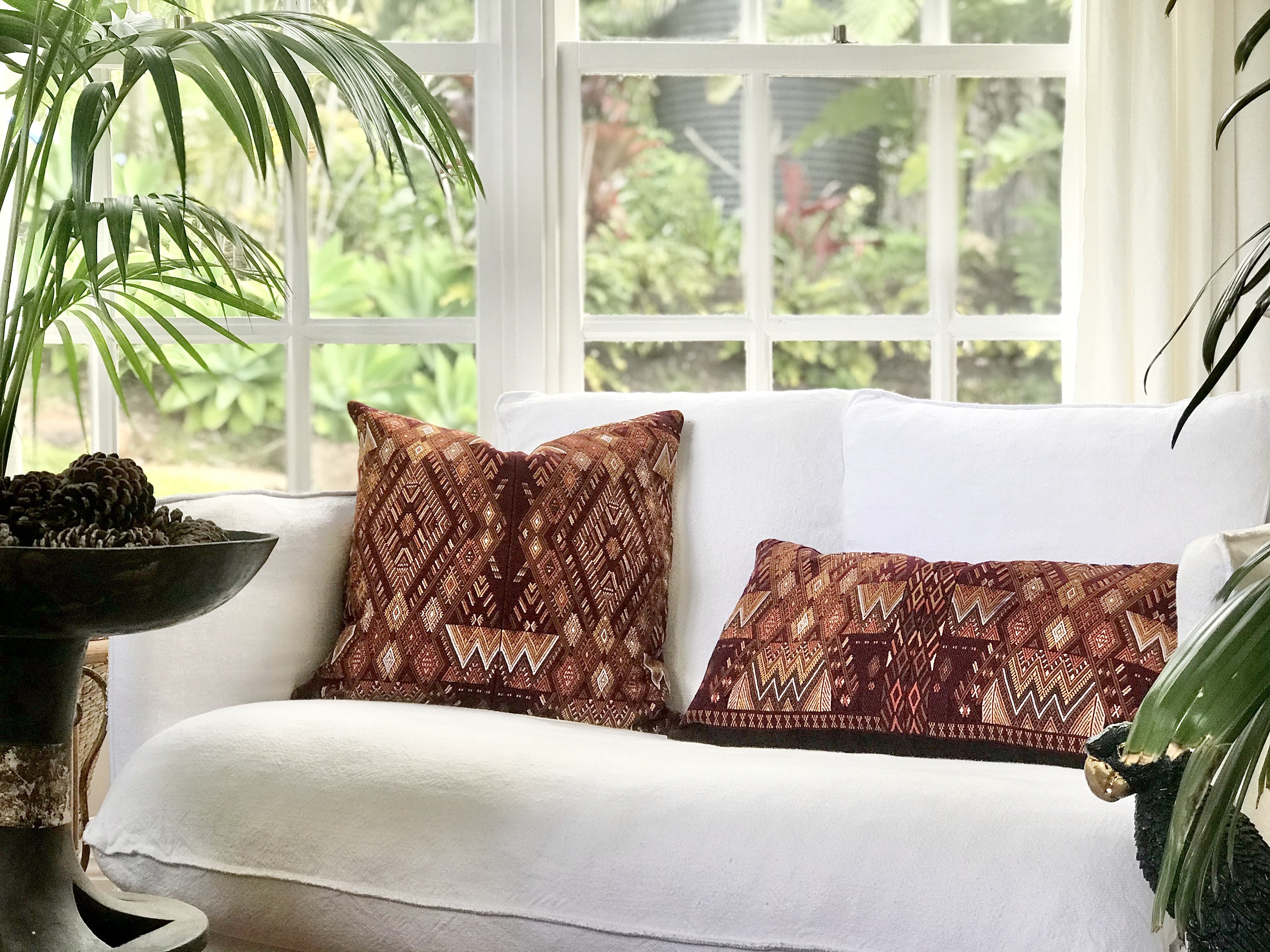 Guatemalan embroidered huipil pillow. Geometric and chevron design in warm browns