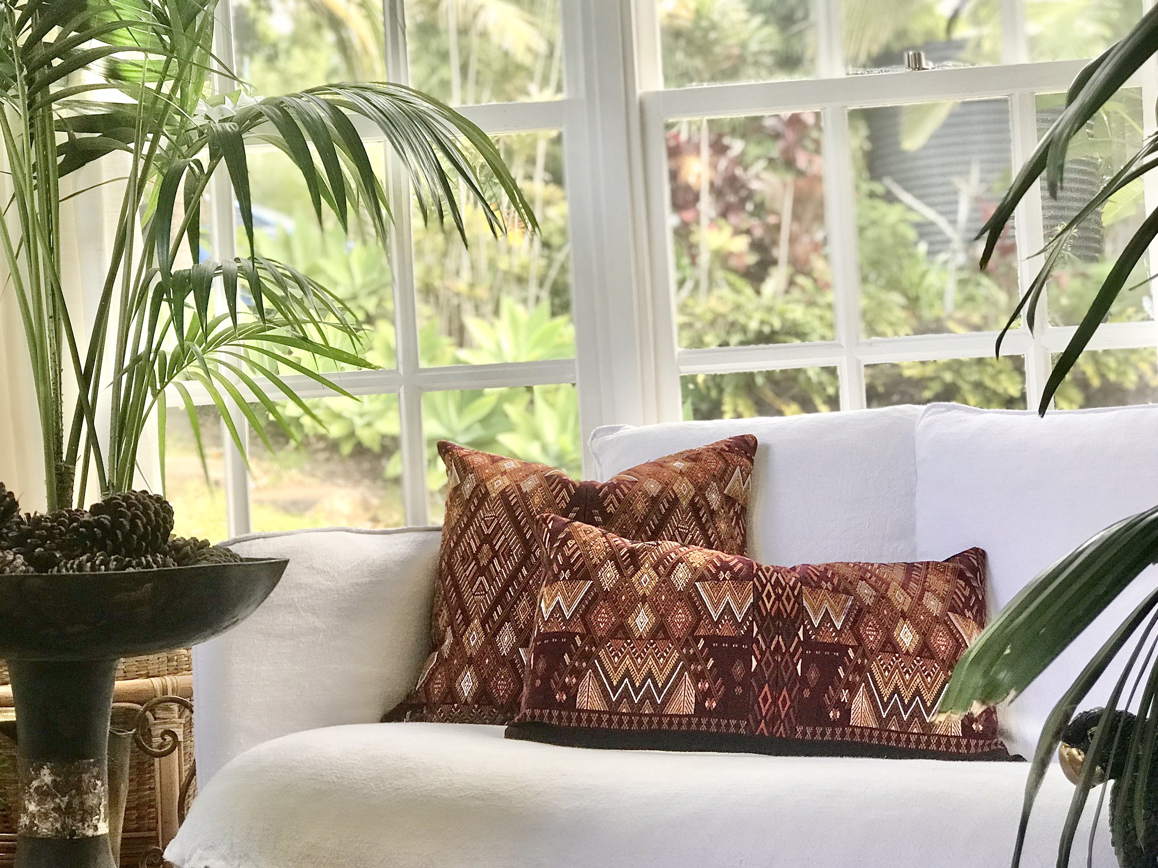Guatemalan embroidered huipil pillow. Geometric and chevron design in warm browns