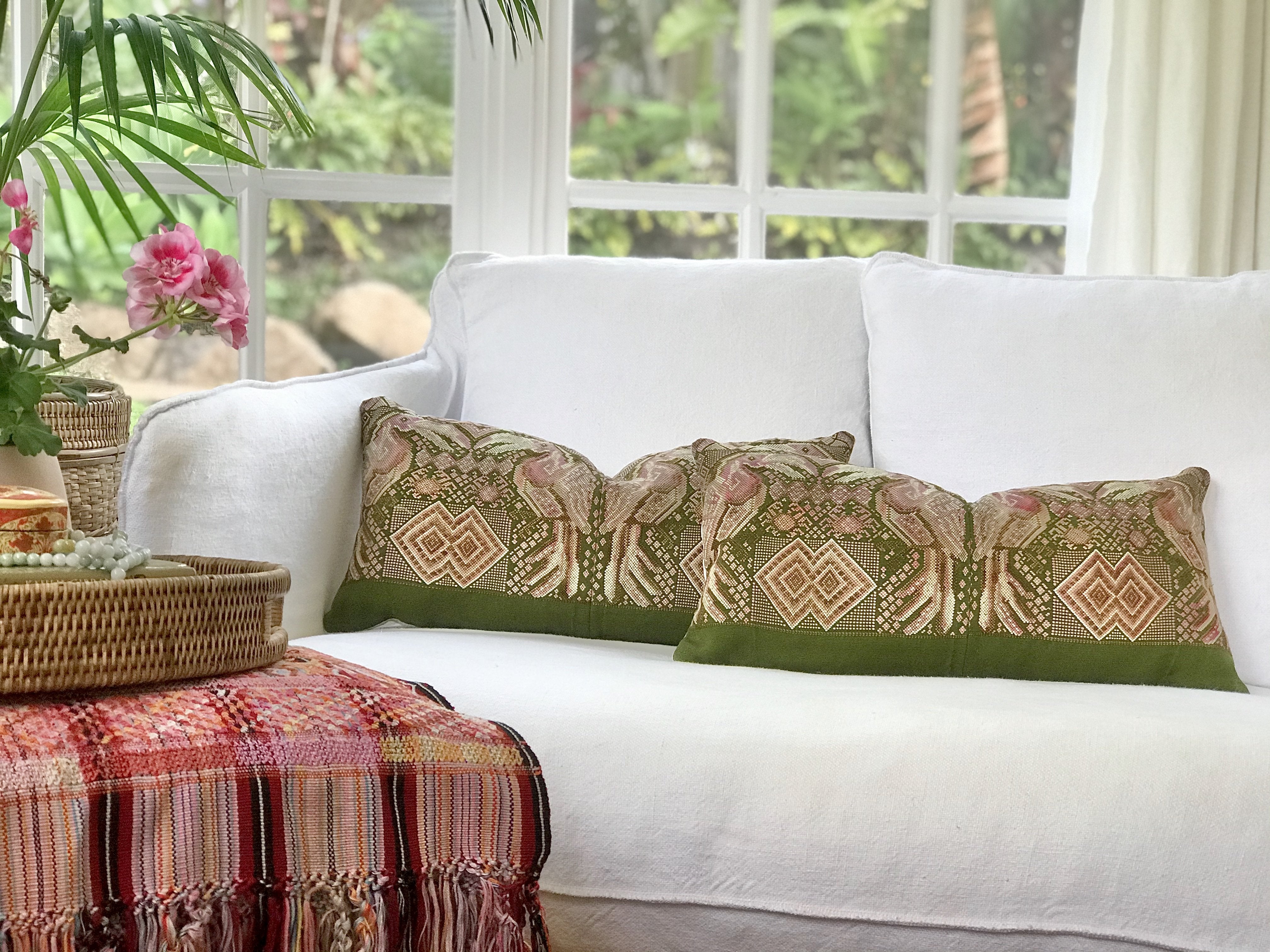 Guatemalan embroidered huipil pillow. Maximilist design of kissing toucan birds and tribal symbols for bohemian decor