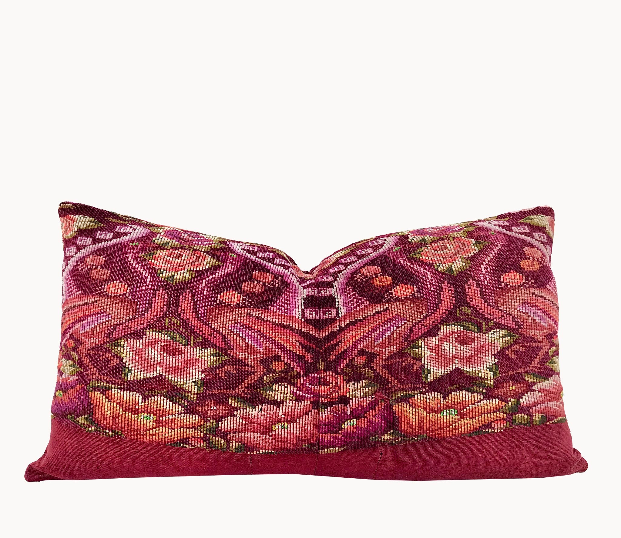 Guatemalan embroidered huipil pillow. Maximilist design of flowers and peacocks in rich burgundy.