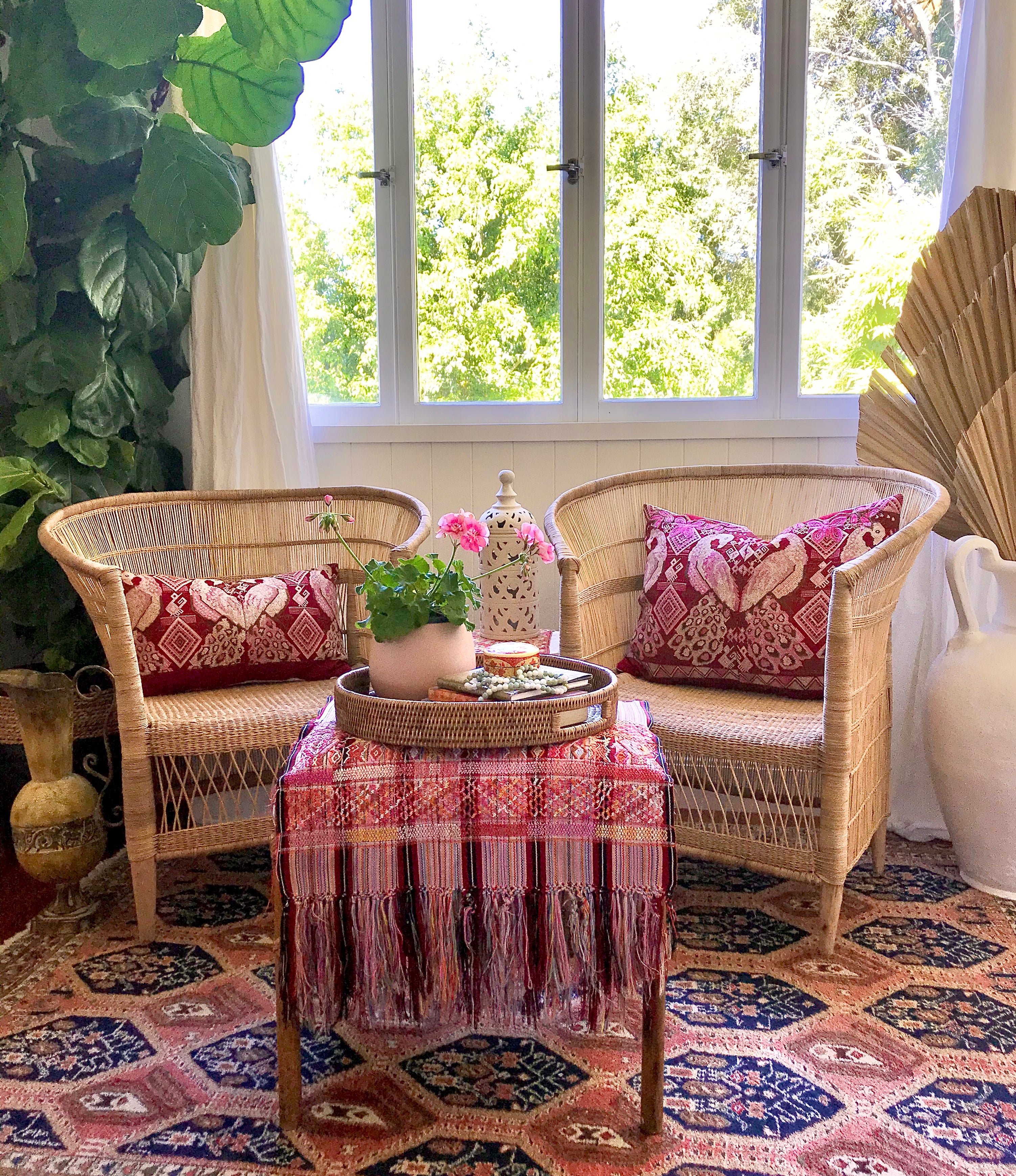 Guatemalan huipil pillow. A vintage textile with a red peacock bird design.