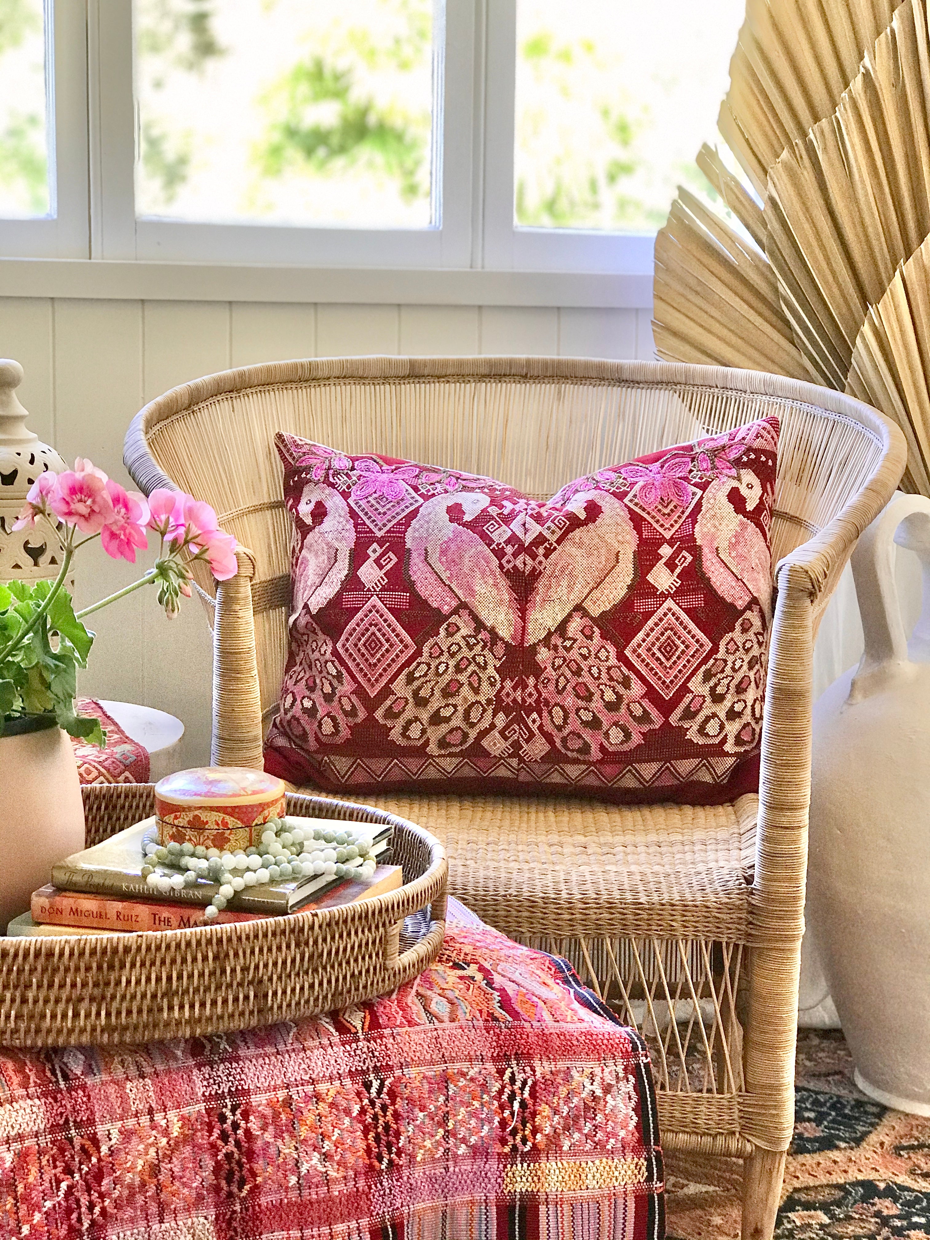 Guatemalan huipil pillow. A vintage textile with a red peacock bird design.