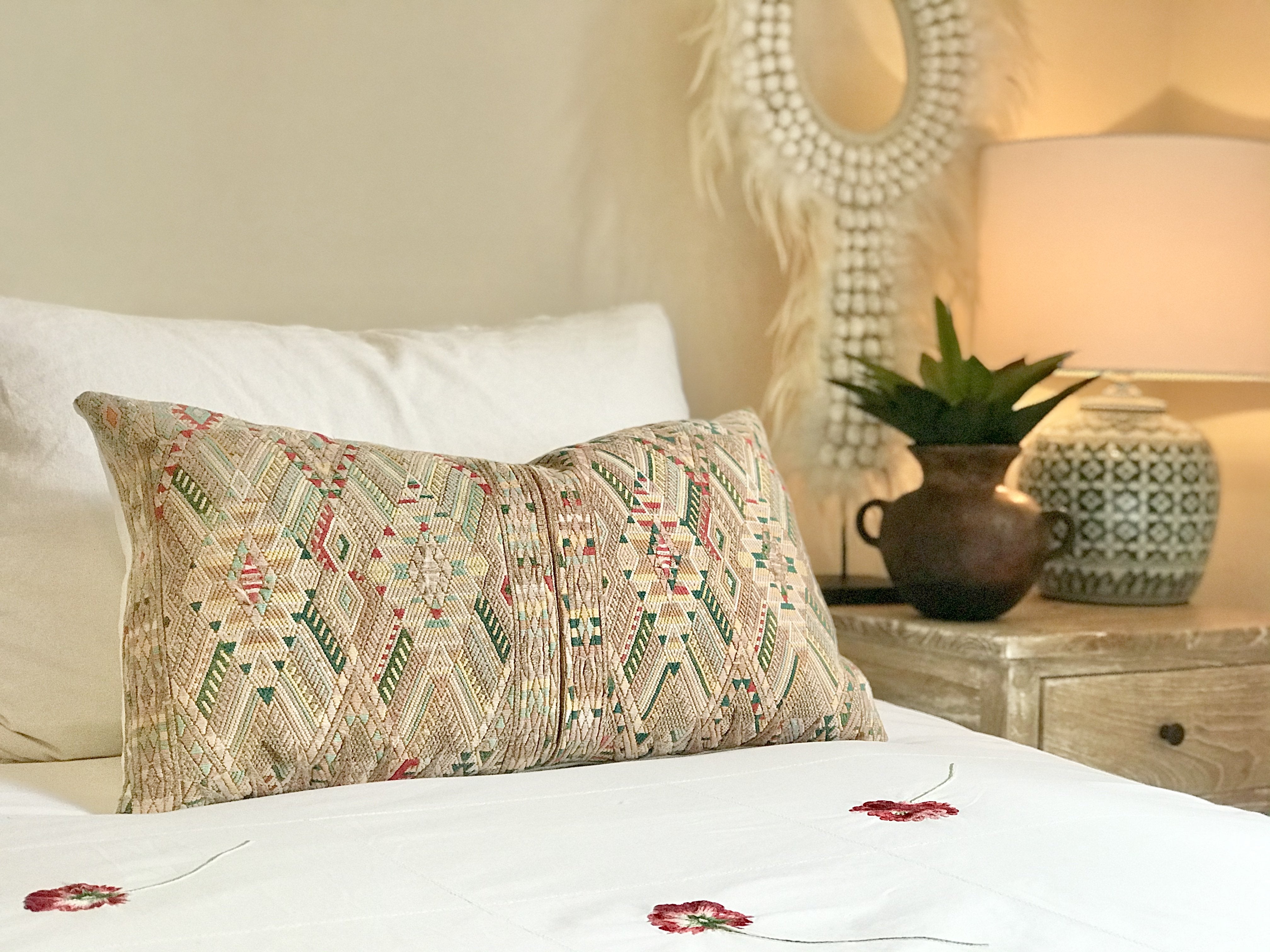 Guatemalan embroidered huipil pillow. Geometric chevron pattern in beige.