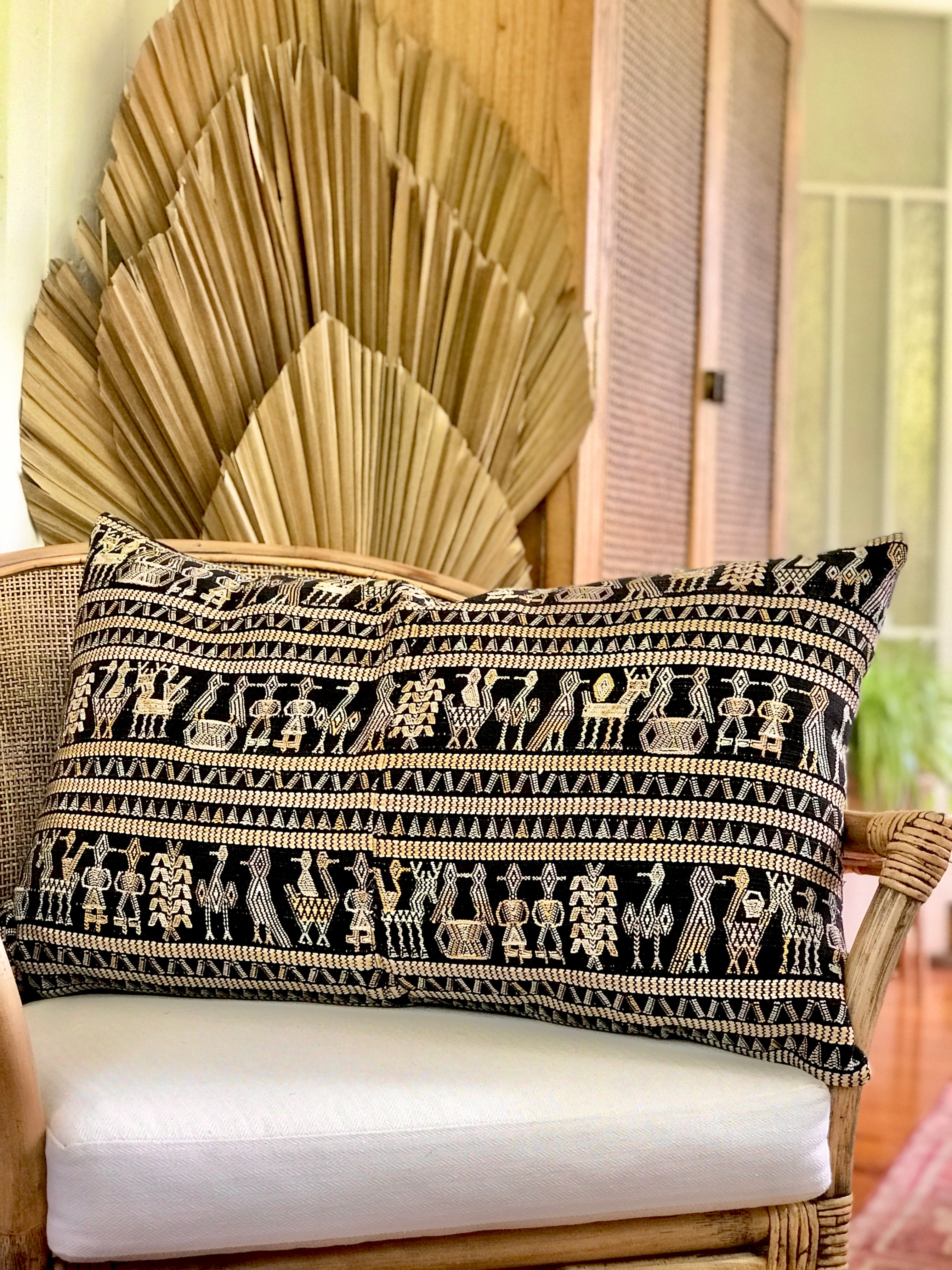 Vintage textile pillows made from a Guatemalan huipil and corte