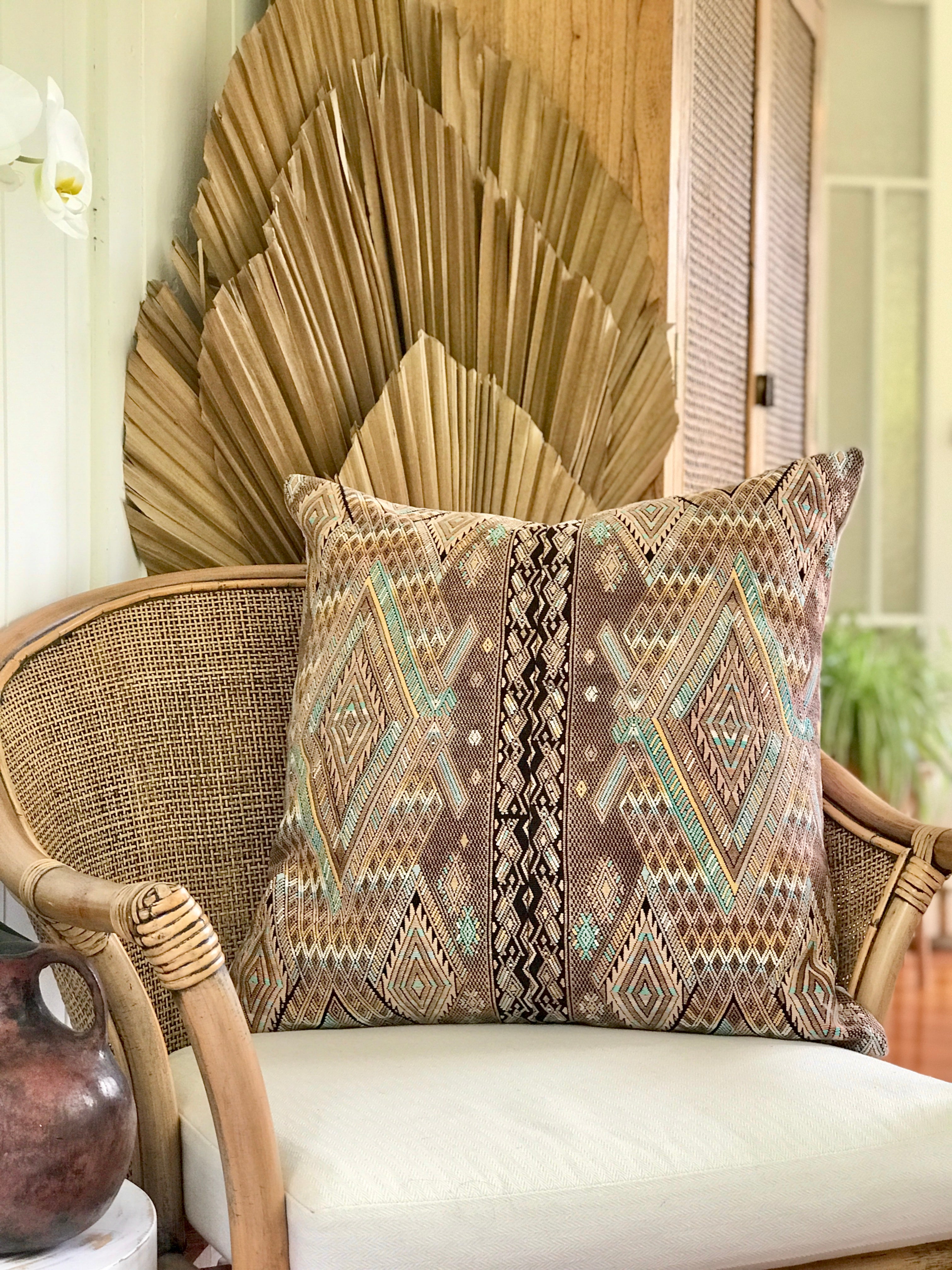 Vintage textile pillows made from a Guatemalan huipil and corte