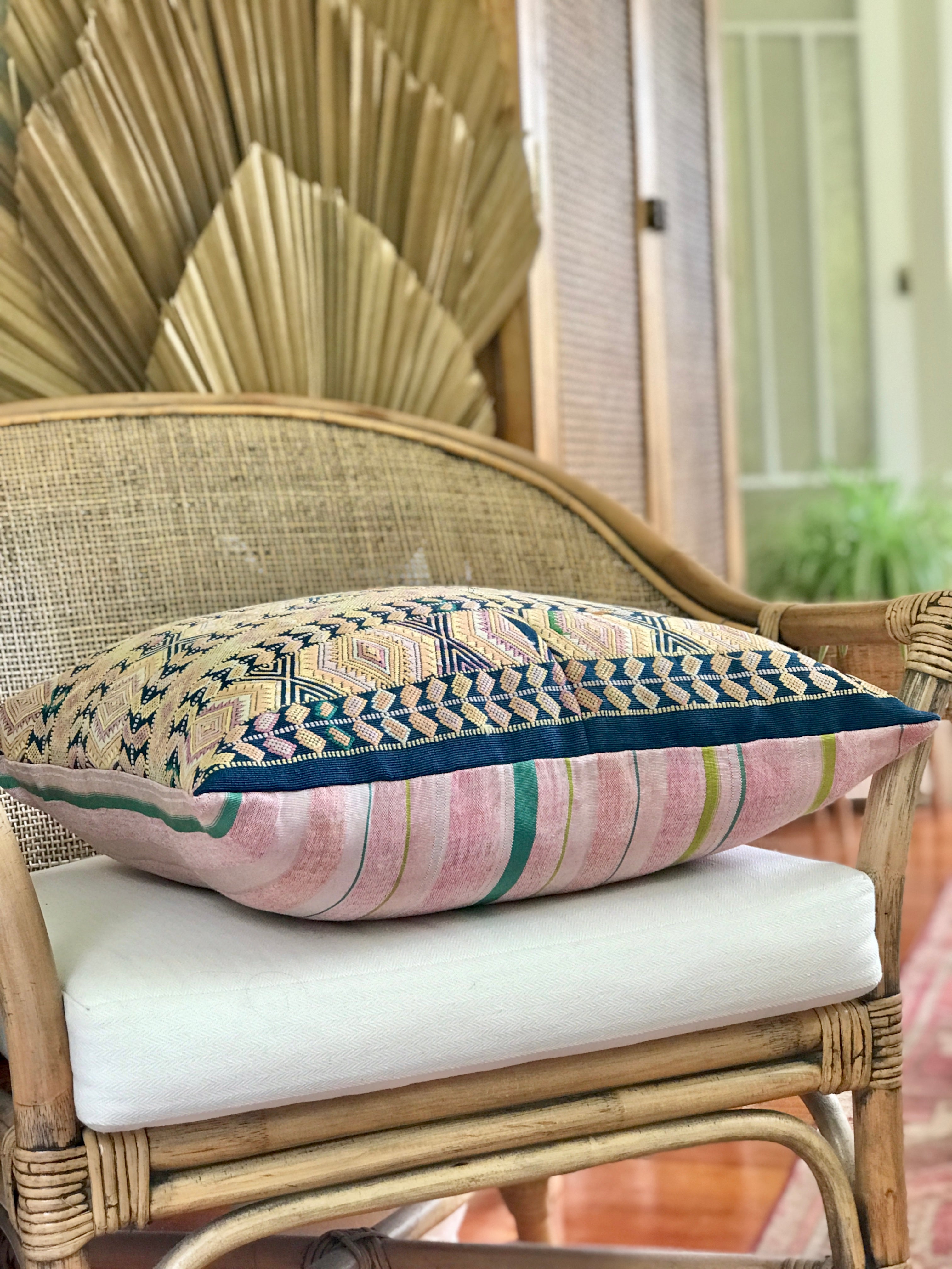 Vintage textile pillows made from a Guatemalan huipil and corte
