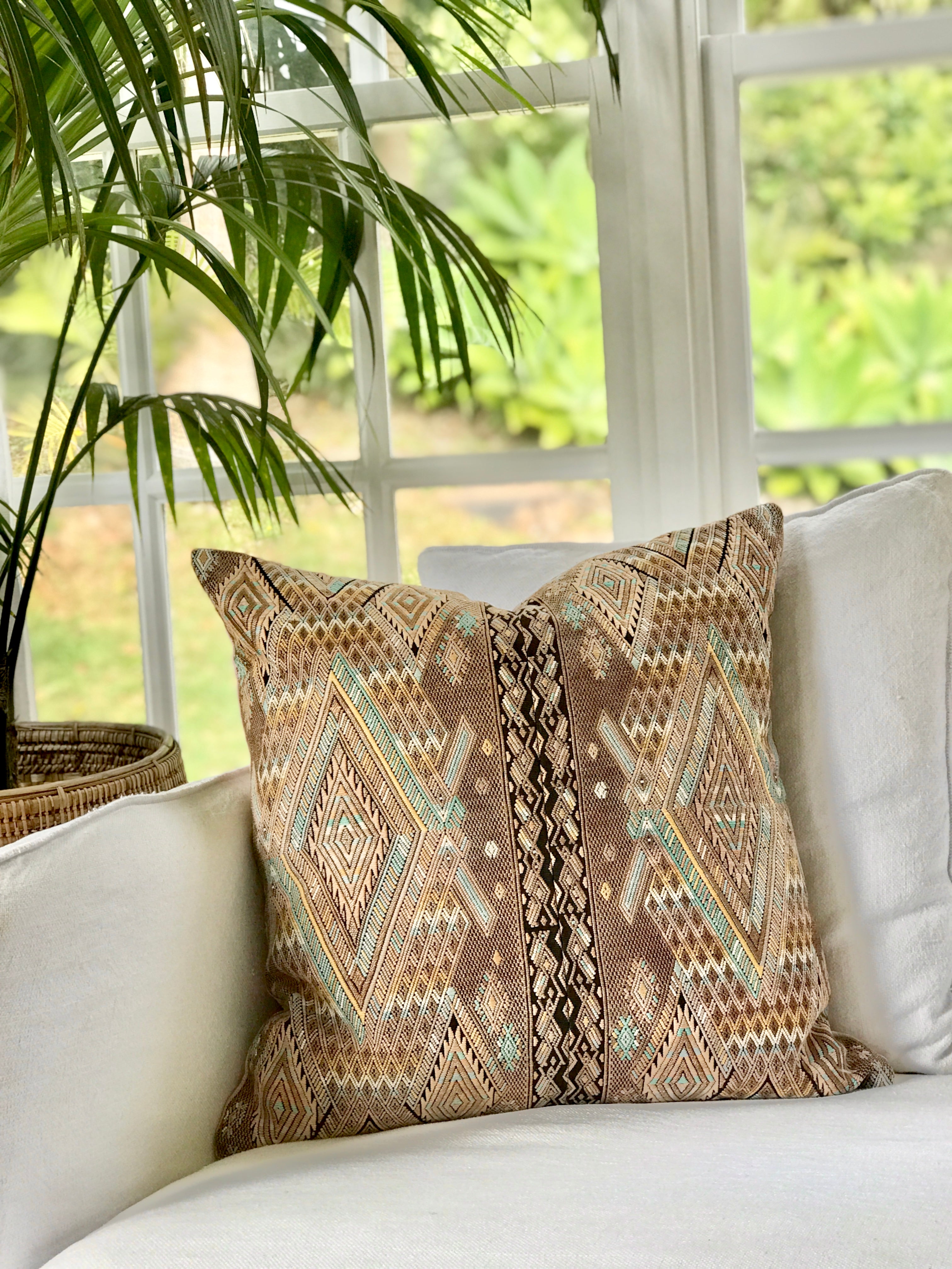 Vintage textile pillows made from a Guatemalan huipil and corte