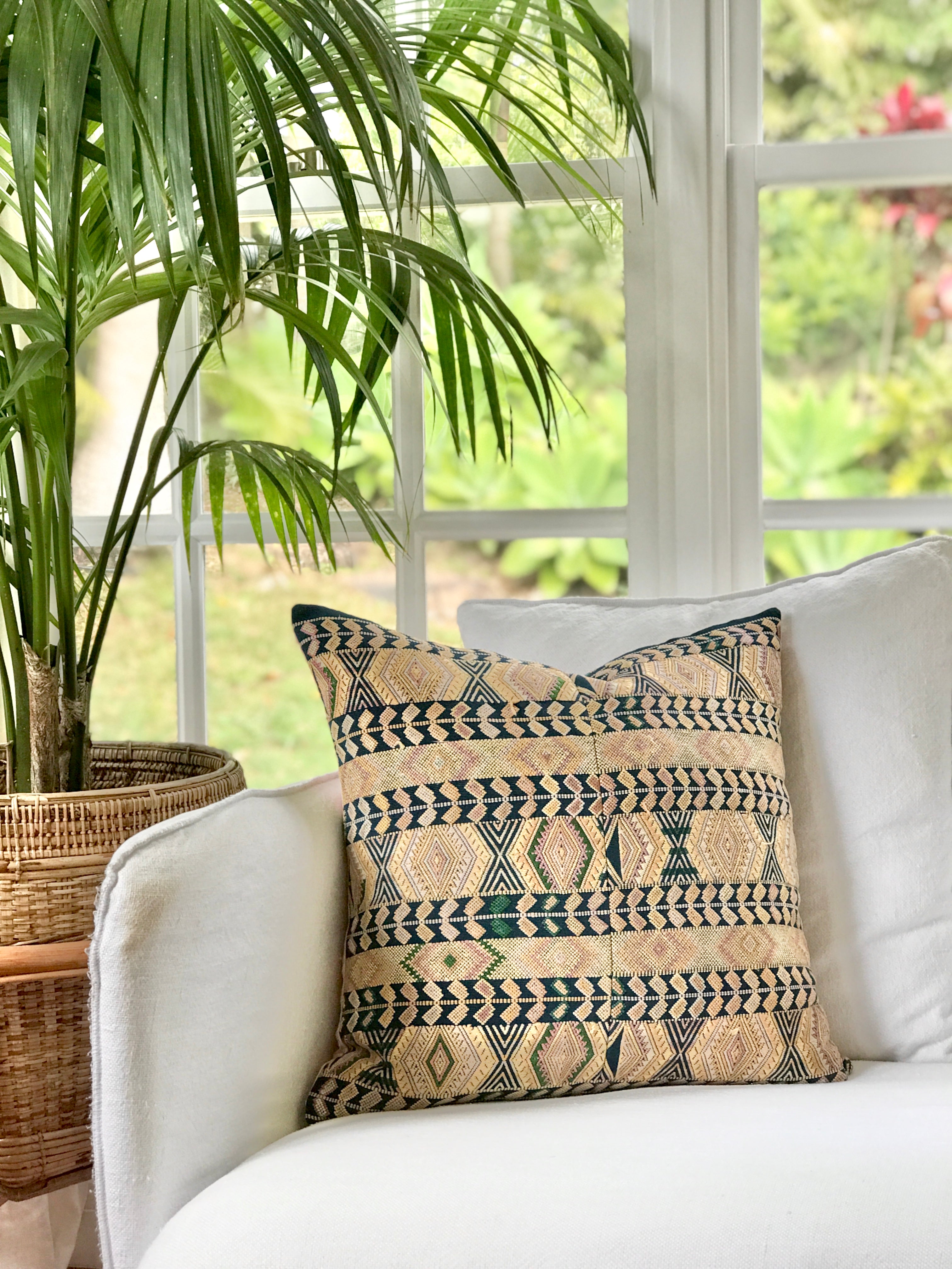 Vintage textile pillows made from a Guatemalan huipil and corte