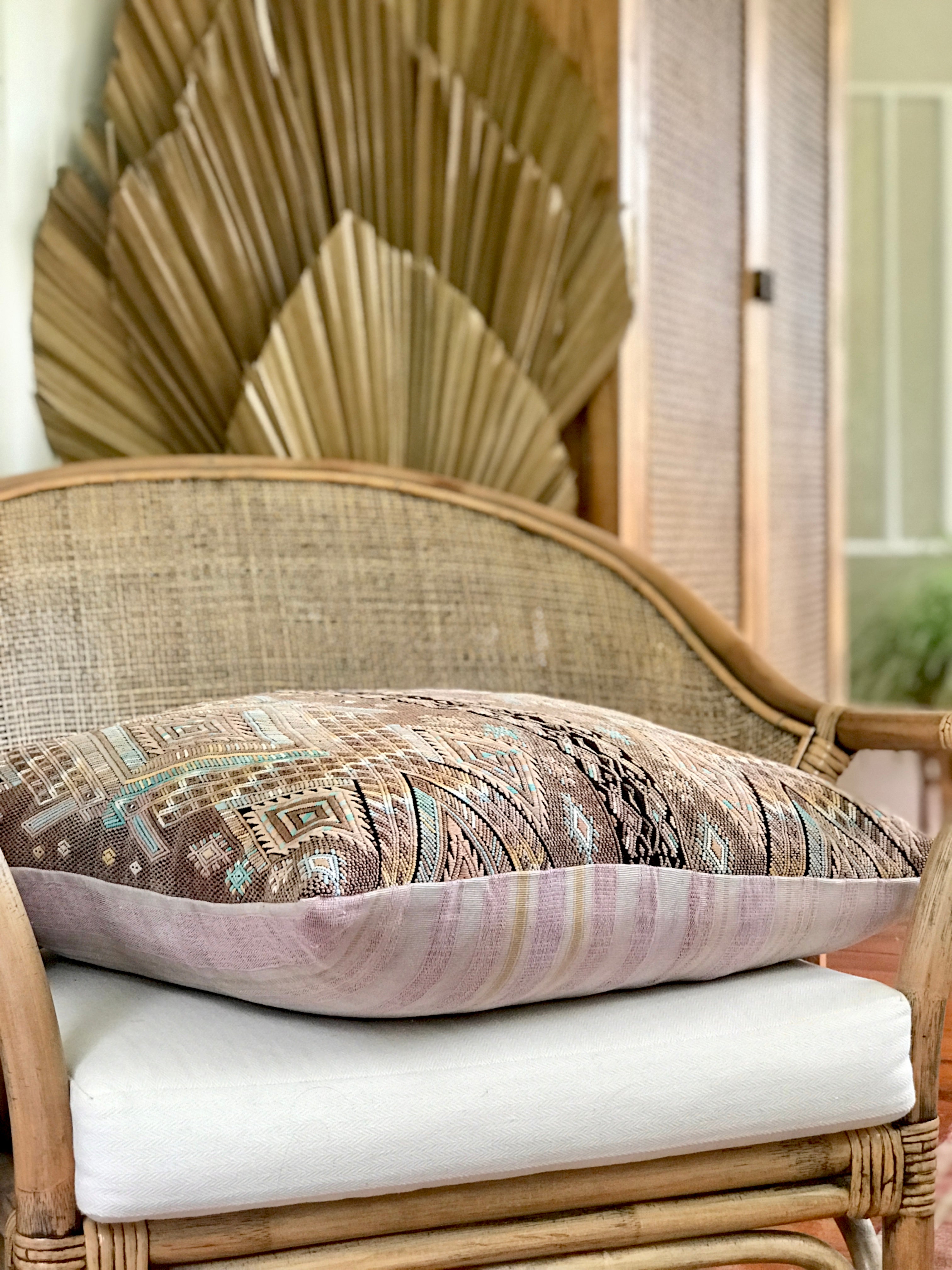 Vintage textile pillows made from a Guatemalan huipil and corte