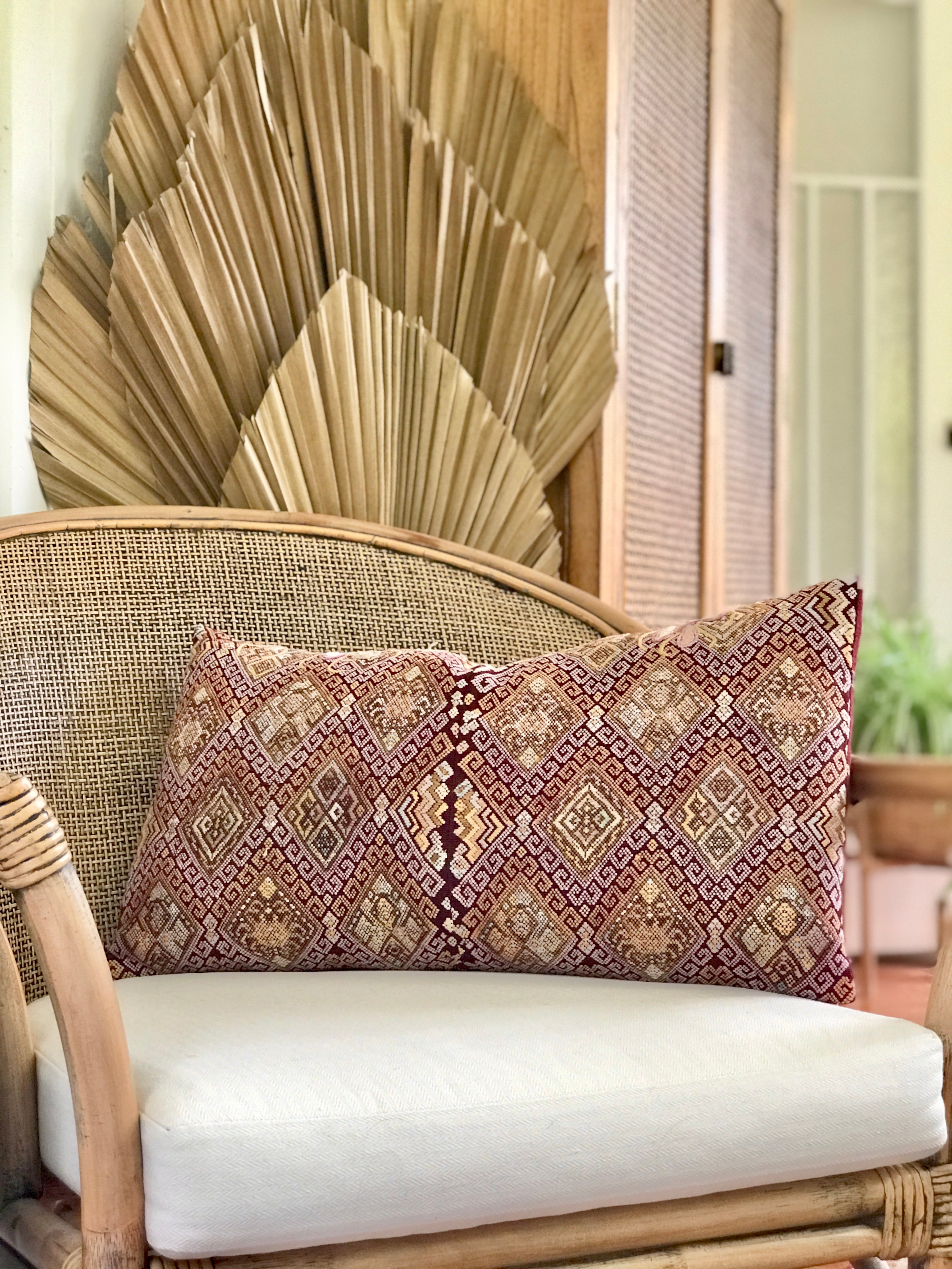 Vintage textile pillows made from a Guatemalan huipil and corte