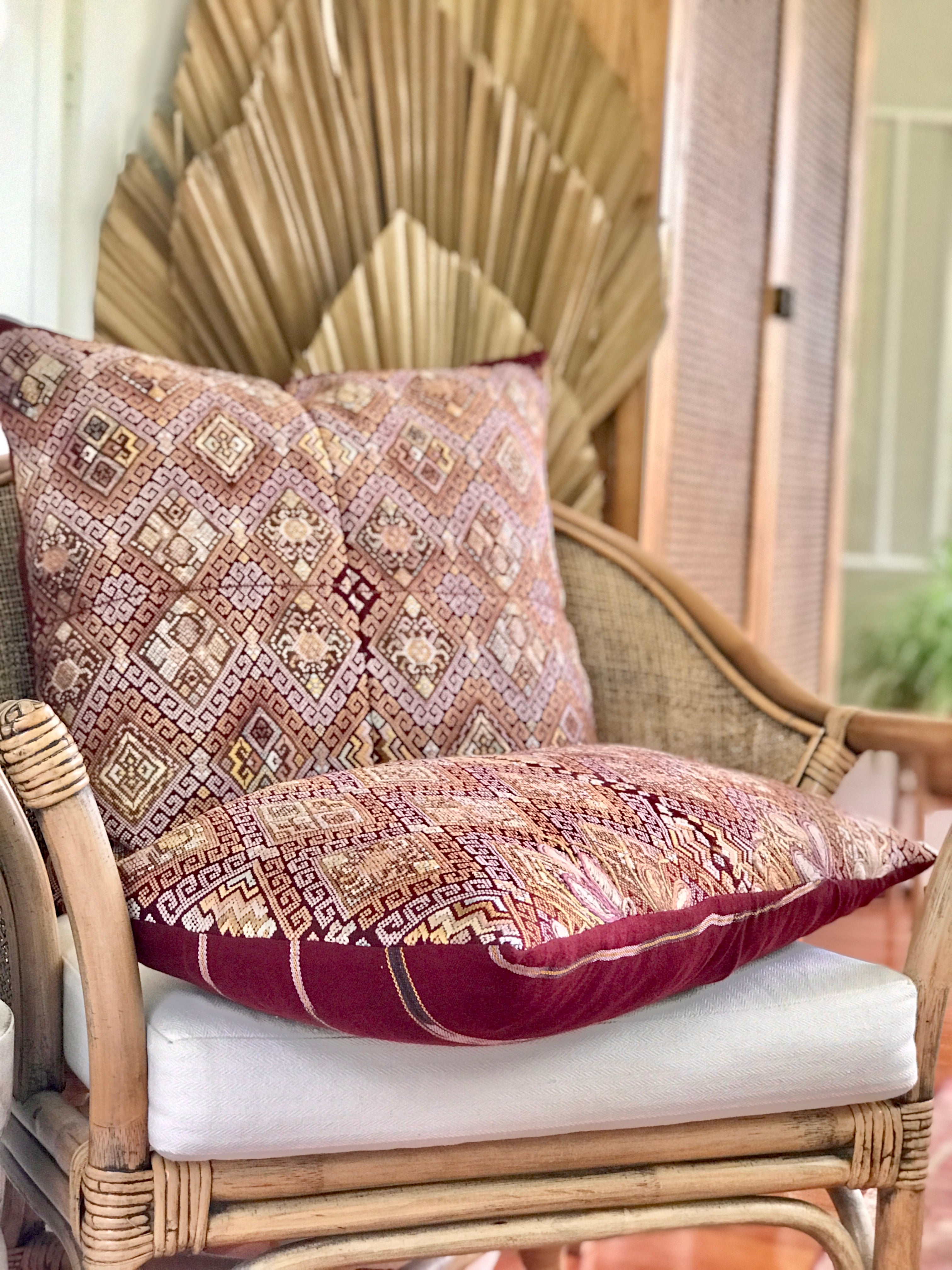 Vintage textile pillows made from a Guatemalan huipil and corte