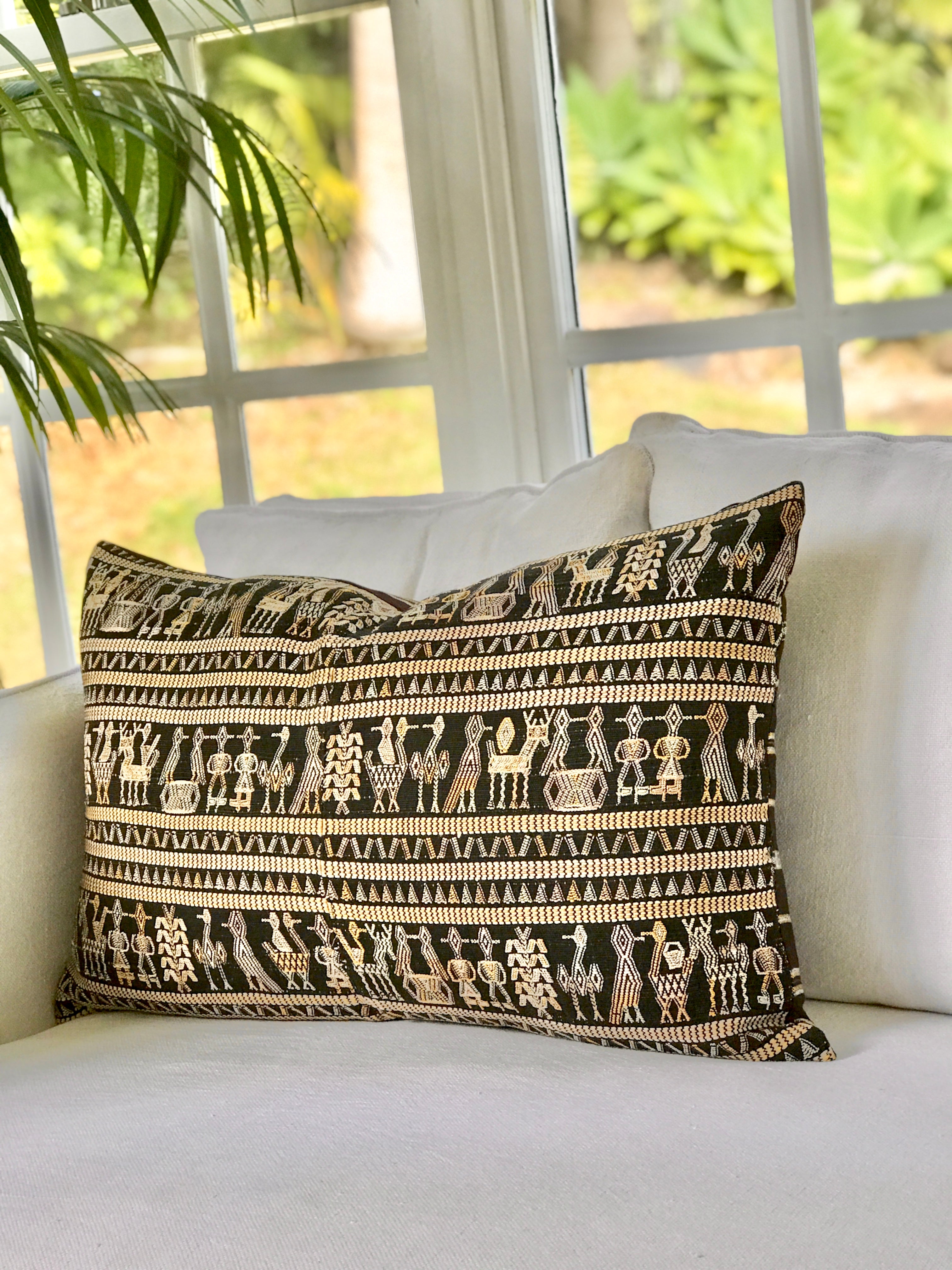 Vintage textile pillows made from a Guatemalan huipil and corte