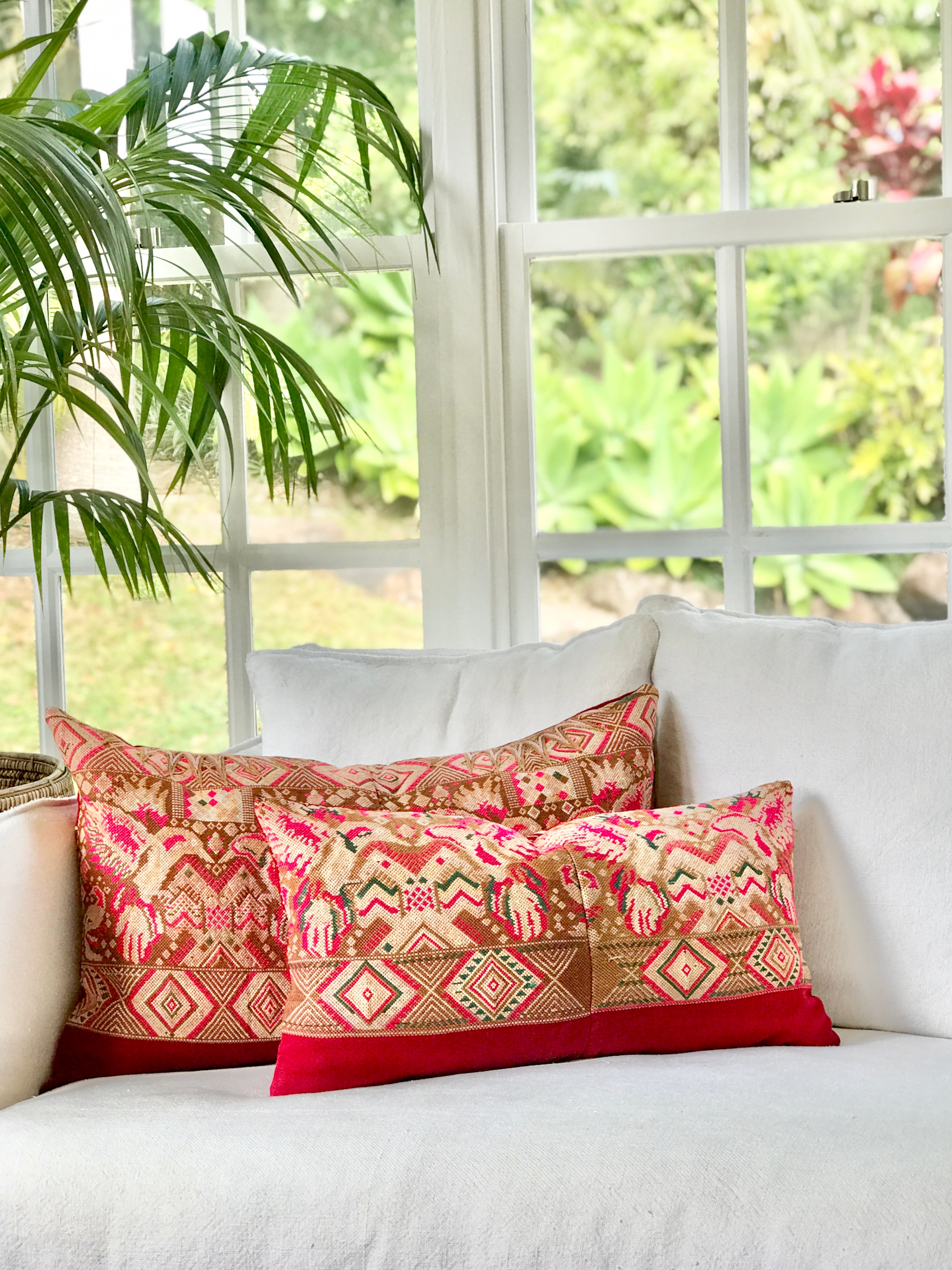 Vintage textile pillows made from a Guatemalan huipil and corte
