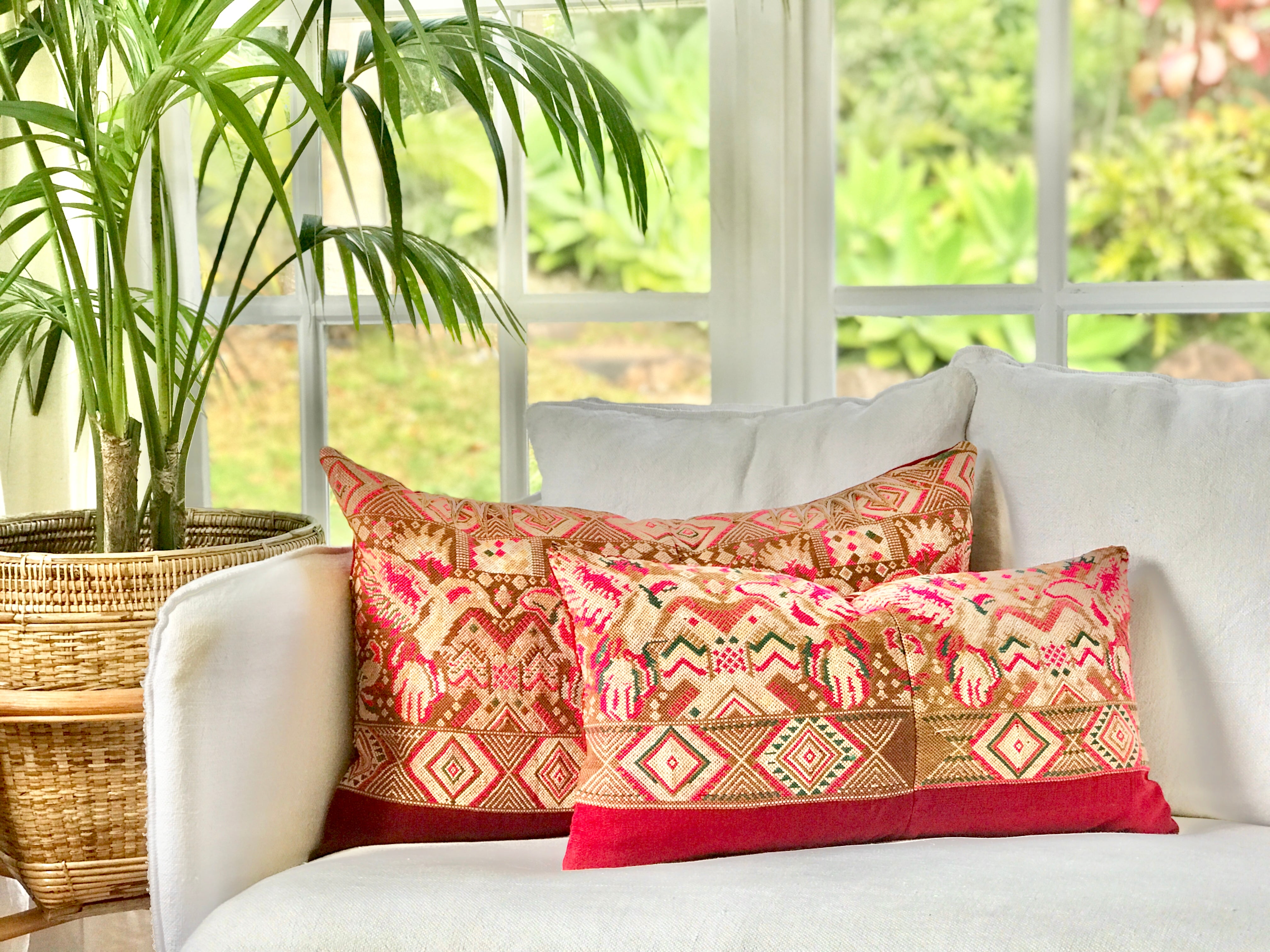 Vintage textile pillows made from a Guatemalan huipil and corte