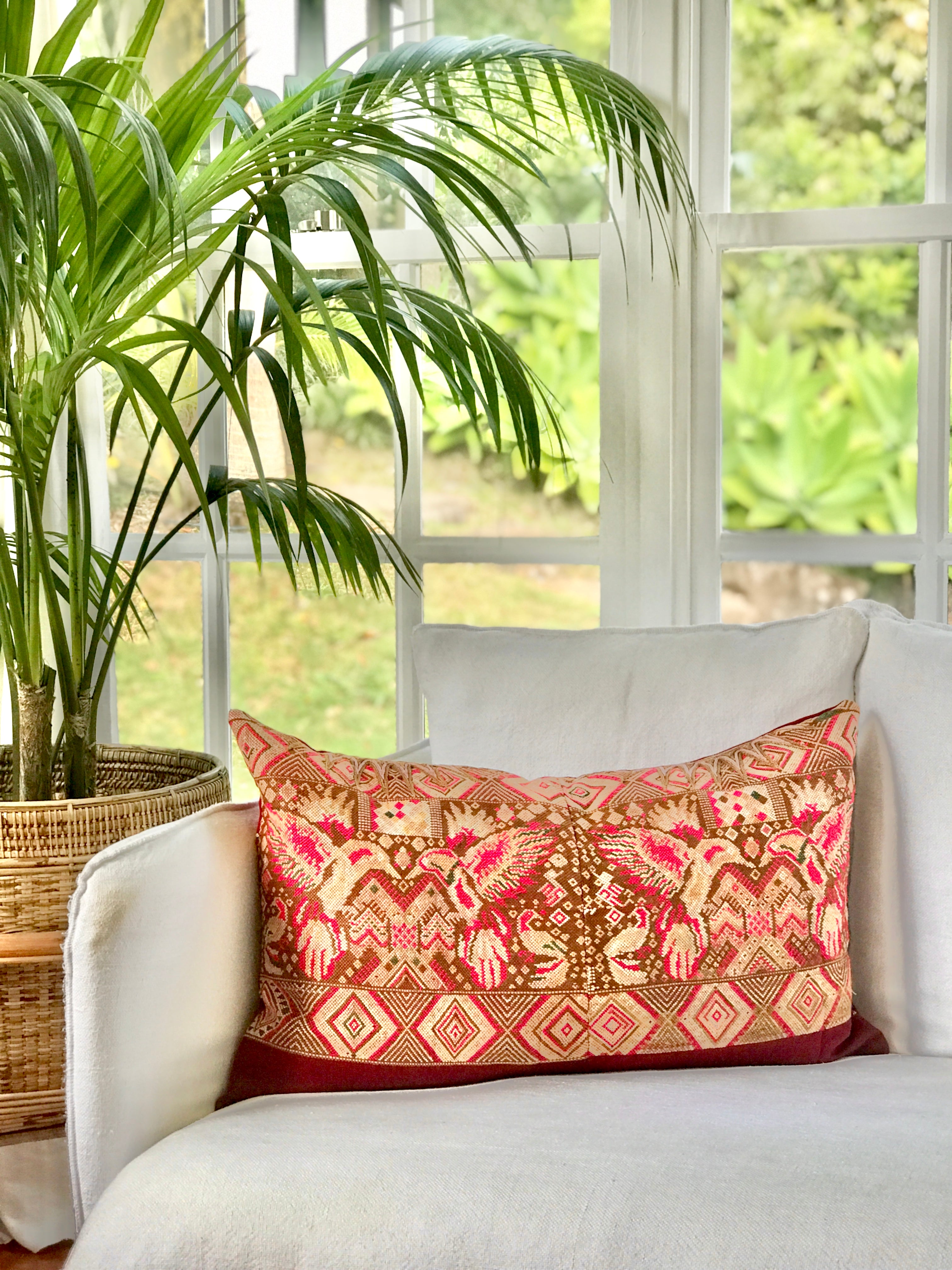 Vintage textile pillows made from a Guatemalan huipil and corte