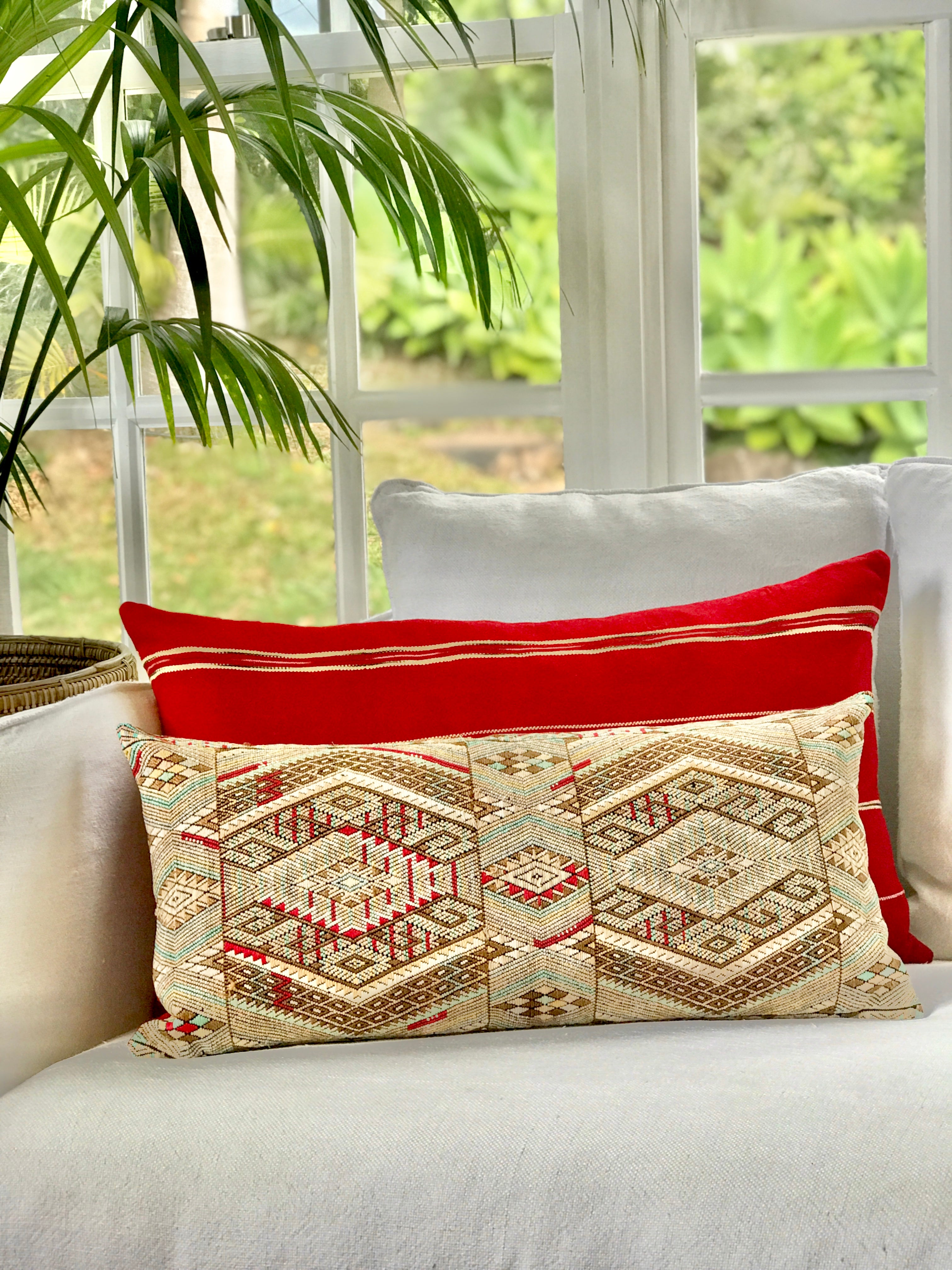 Vintage textile pillows made from a Guatemalan huipil and corte