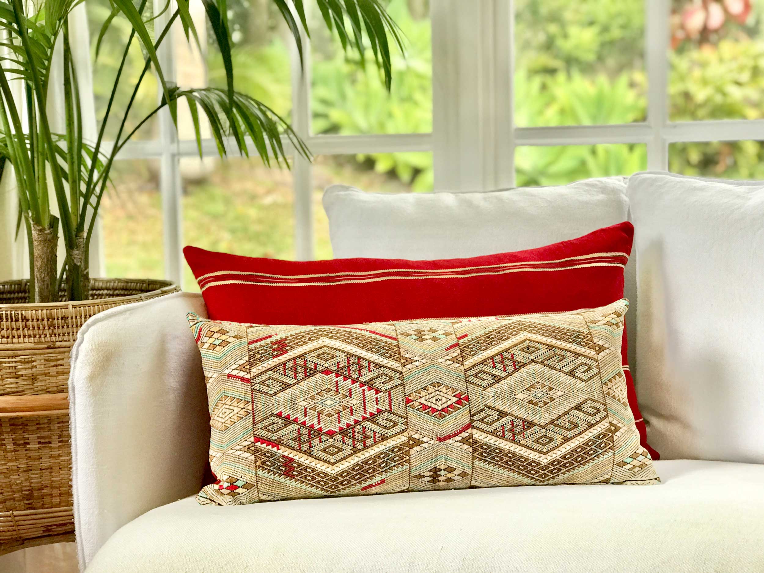 Vintage textile pillows made from a Guatemalan huipil and corte