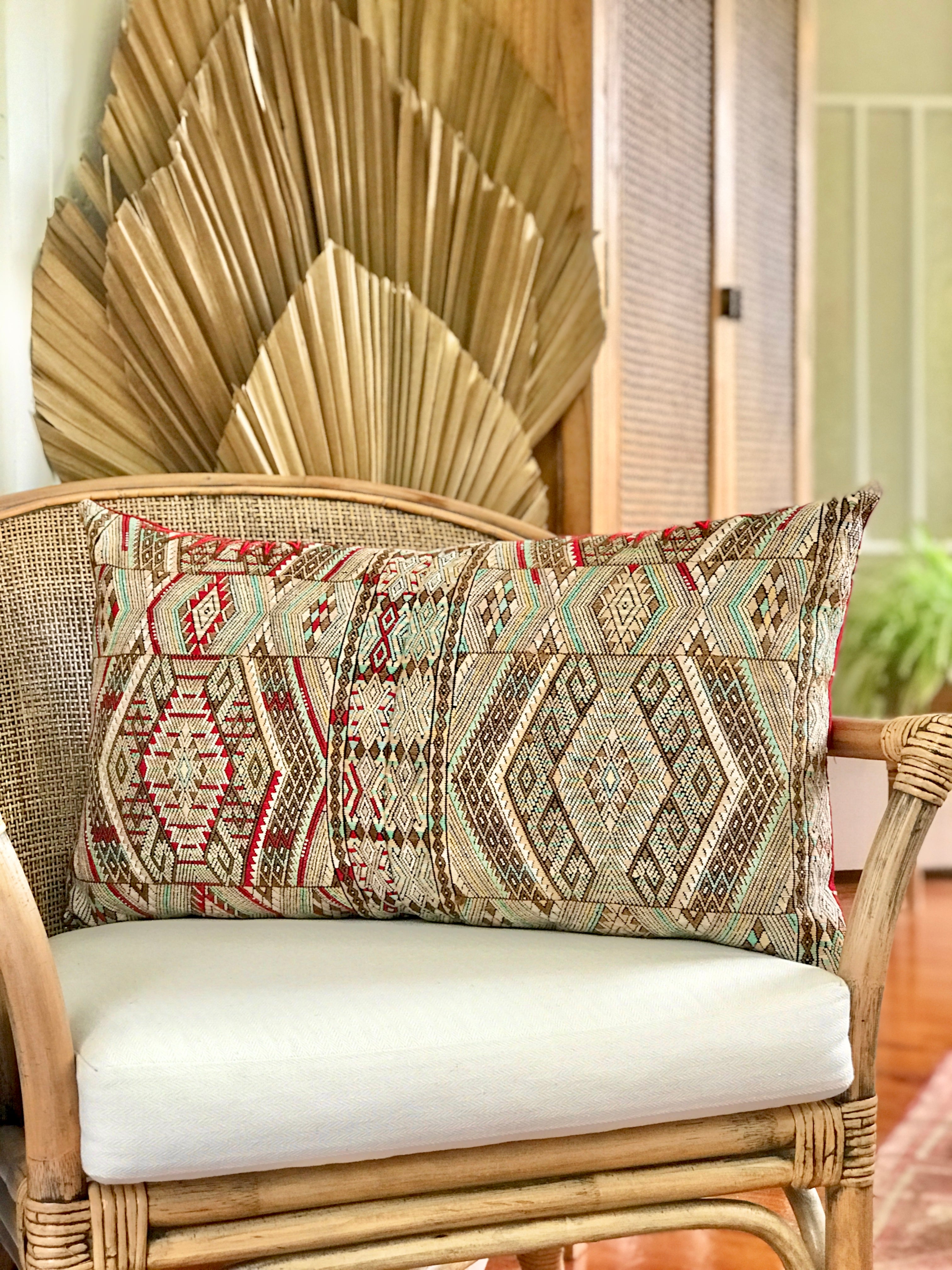 Vintage textile pillows made from a Guatemalan huipil and corte