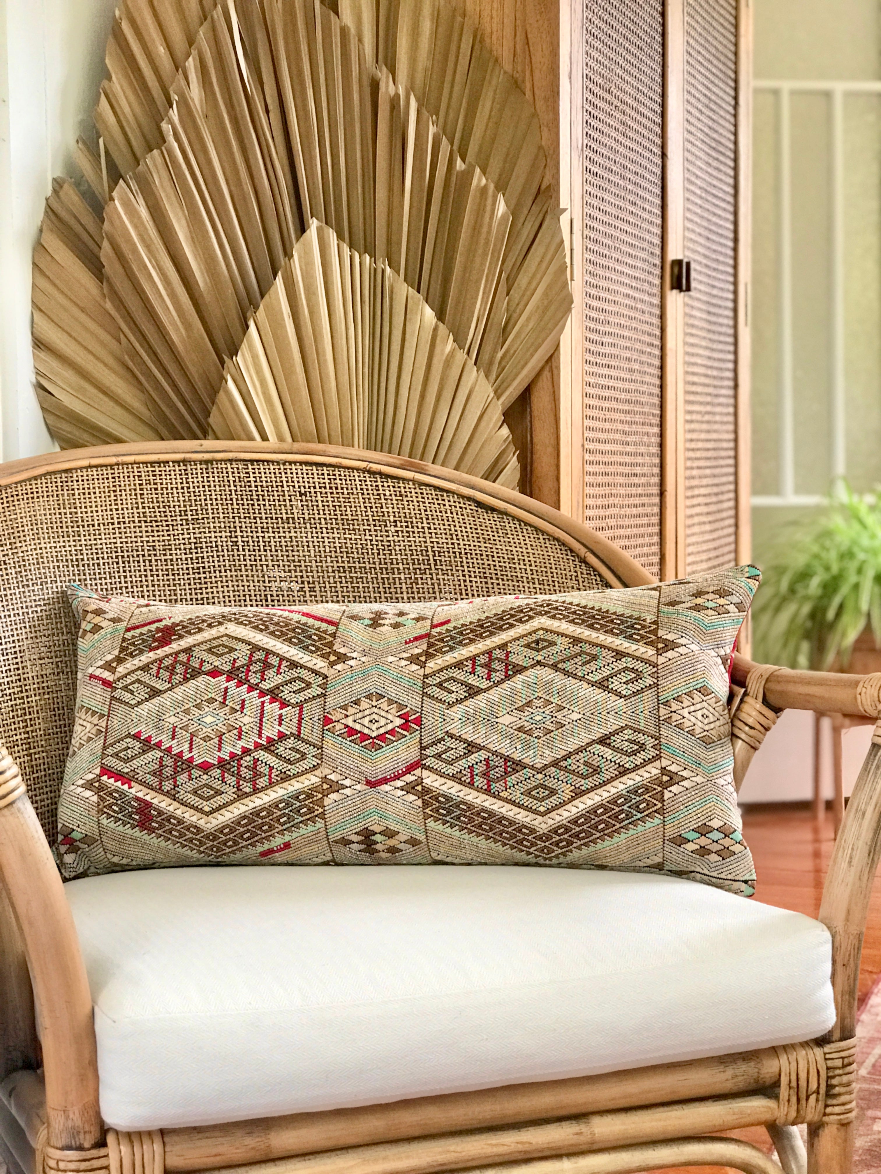 Vintage textile pillows made from a Guatemalan huipil and corte