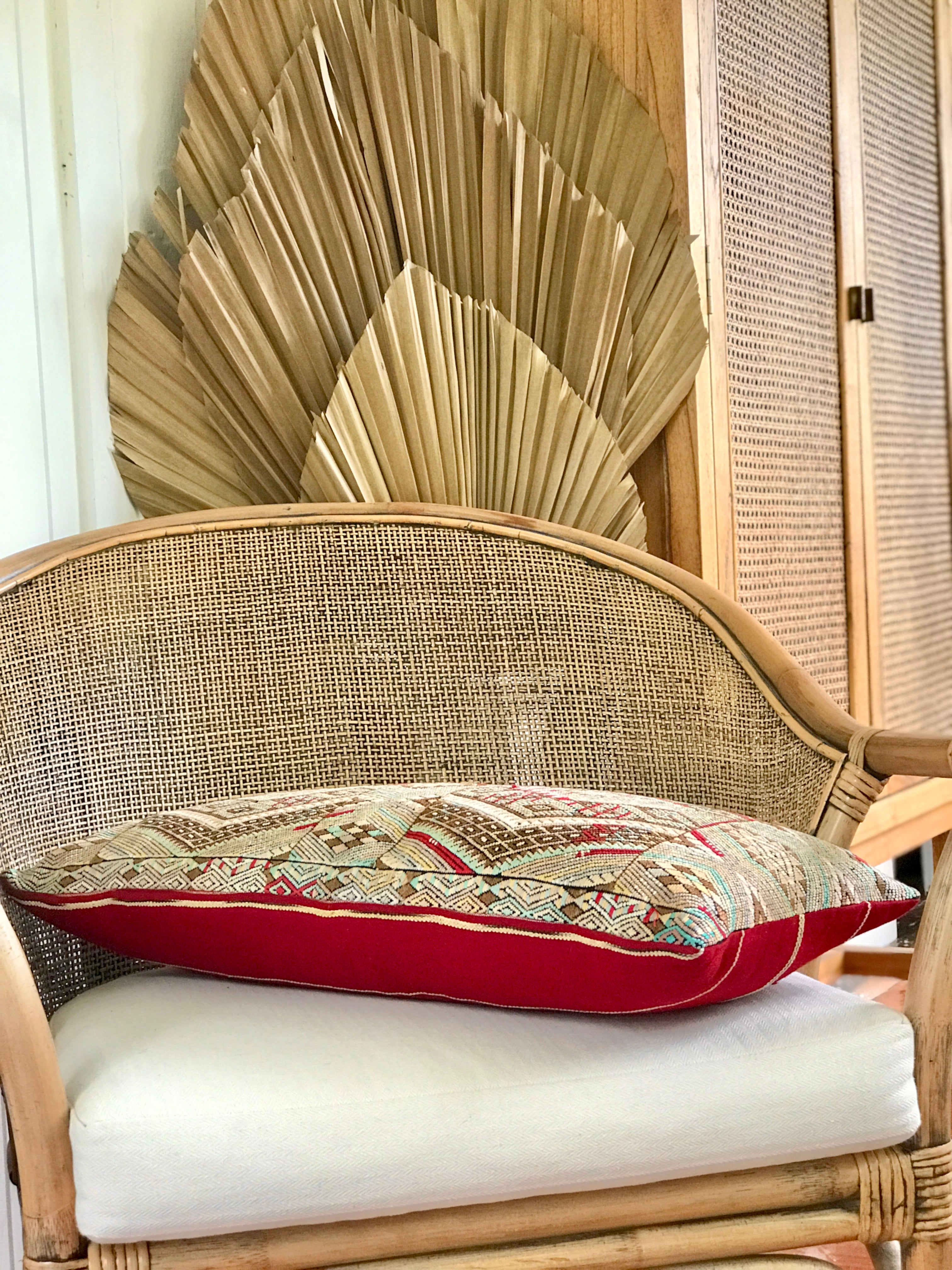 Vintage textile pillows made from a Guatemalan huipil and corte
