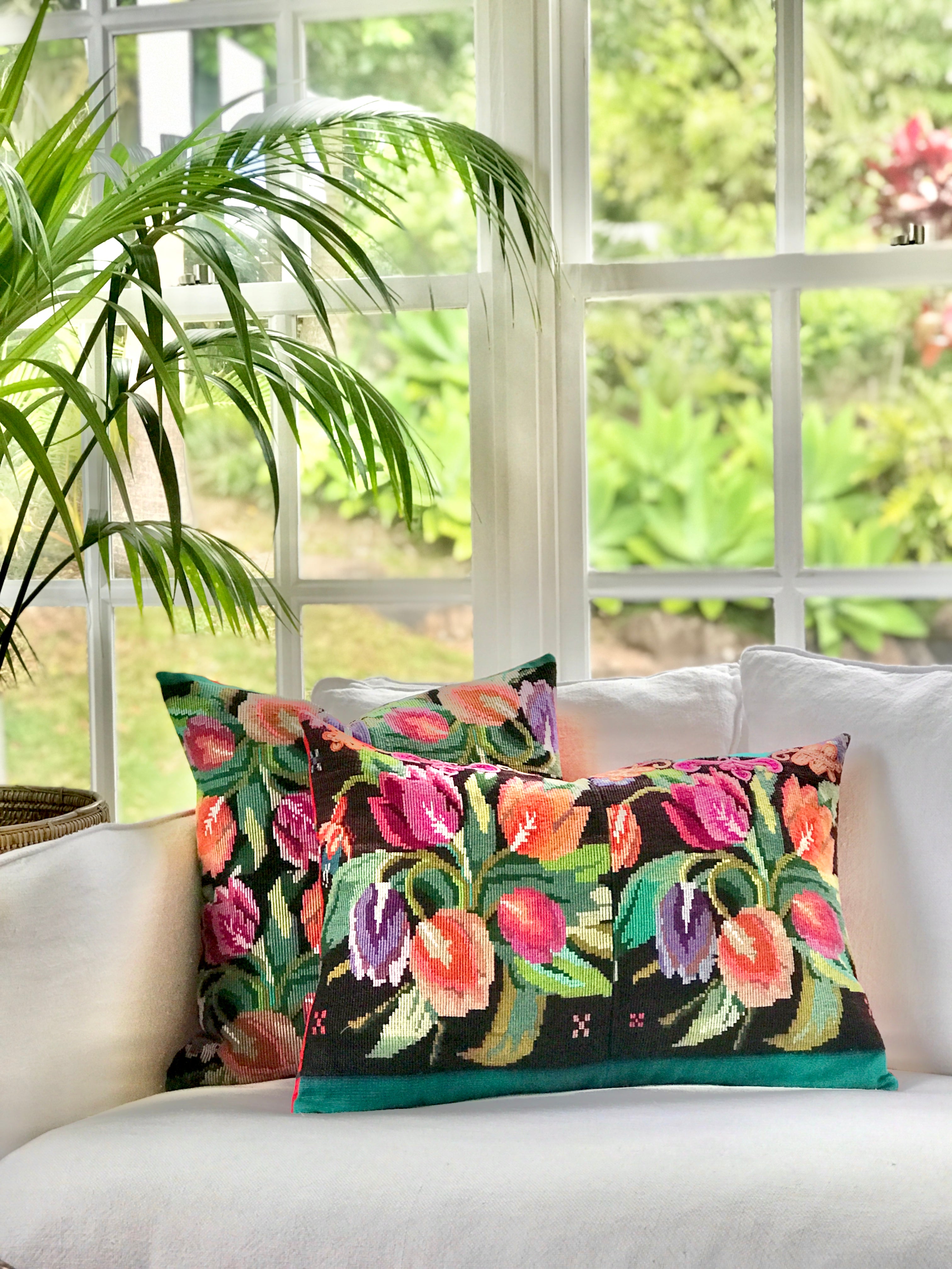 Vintage textile cushions made from a Guatemalan huipil and corte.