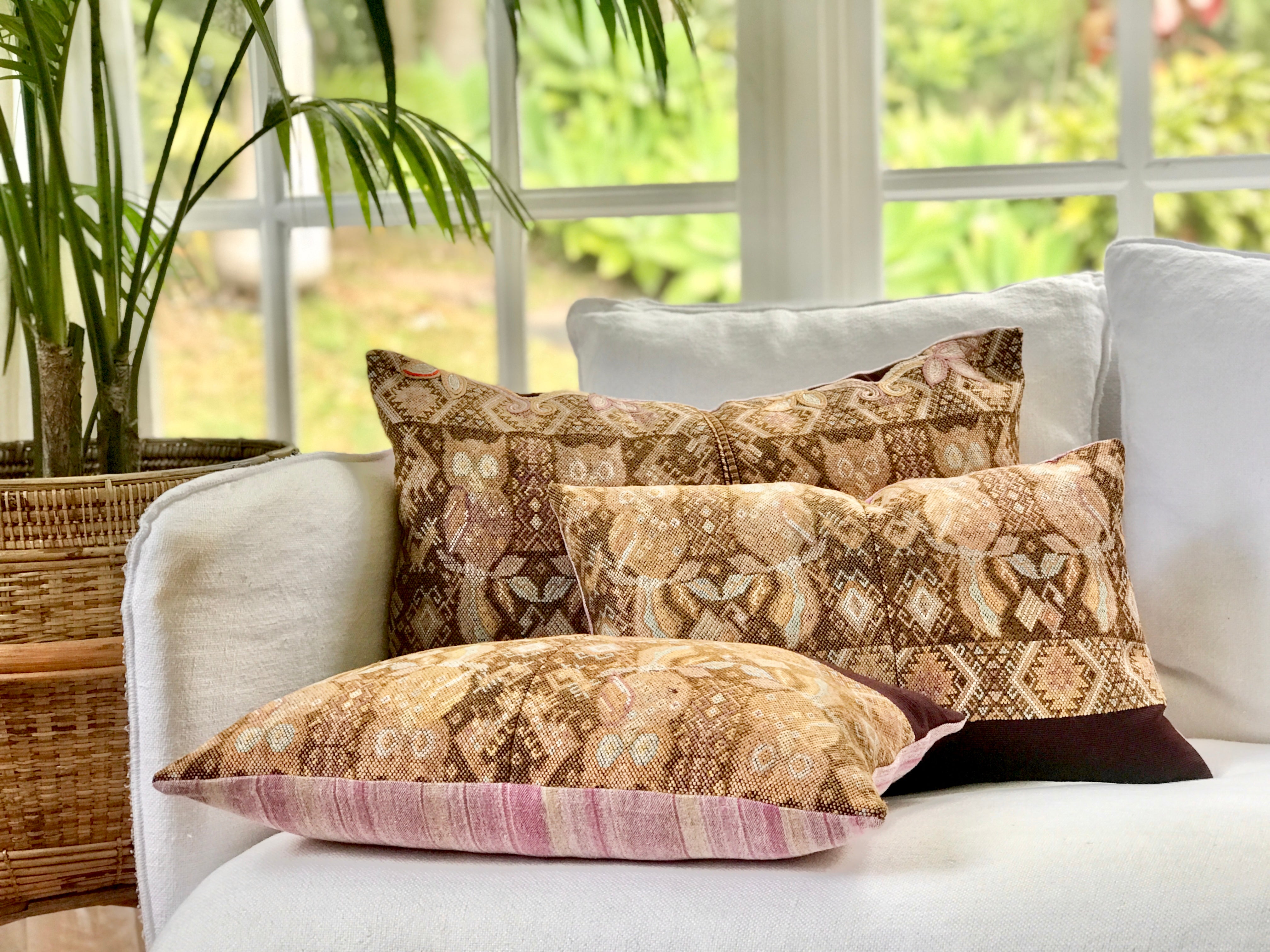 Vintage textile cushions made from a Guatemalan huipil and corte.