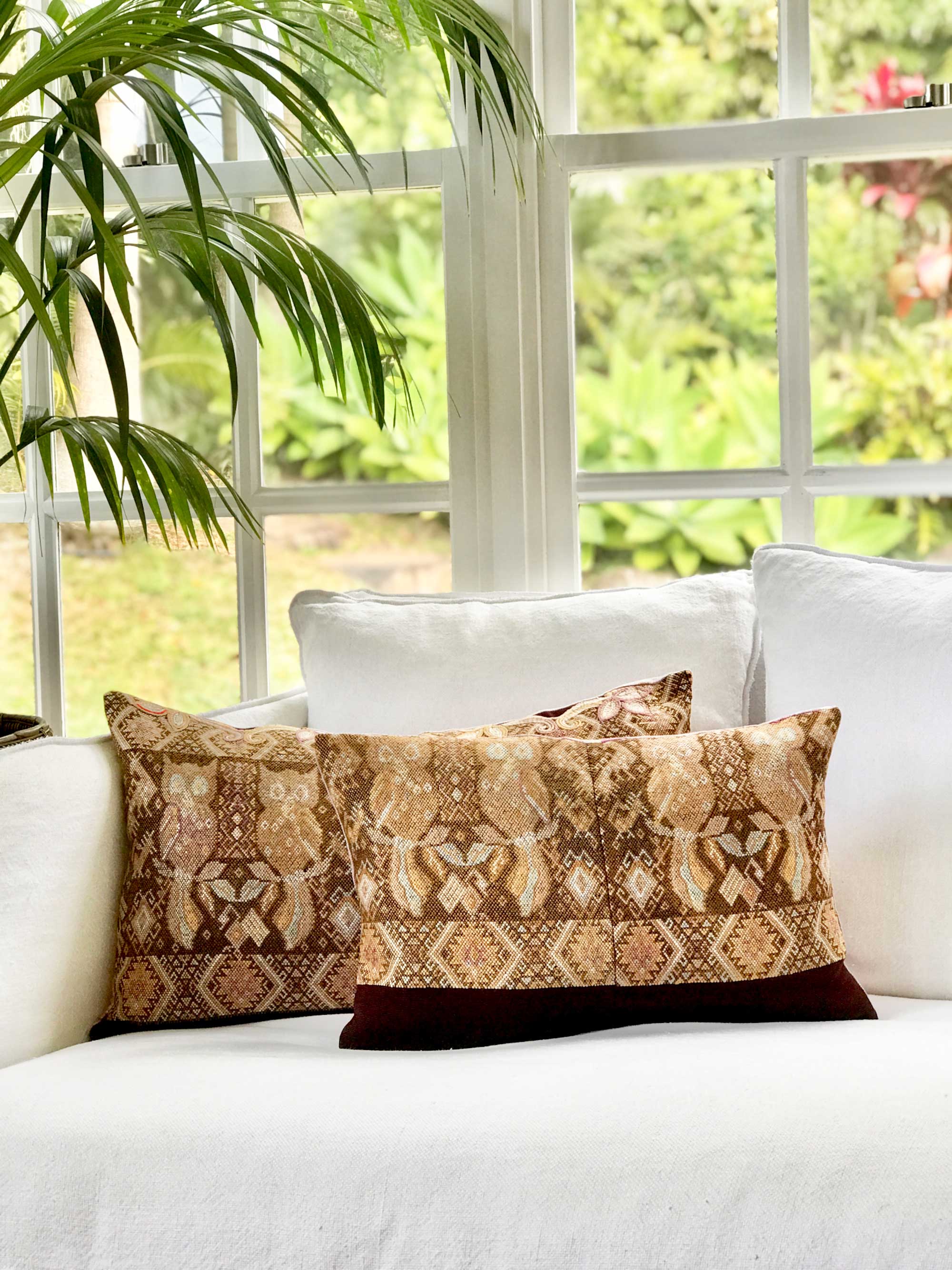 Vintage textile cushions made from a Guatemalan huipil and corte.