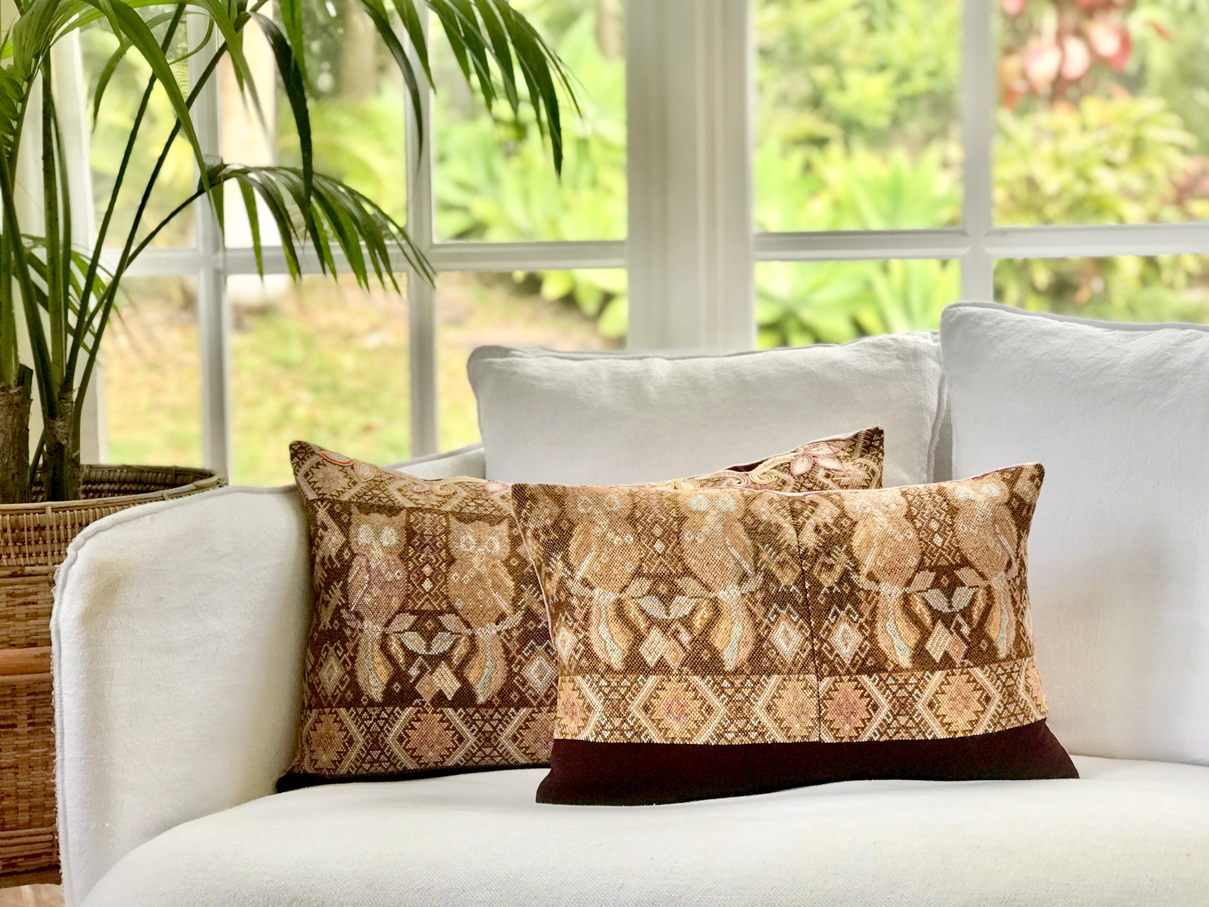 Vintage textile cushions made from a Guatemalan huipil and corte.