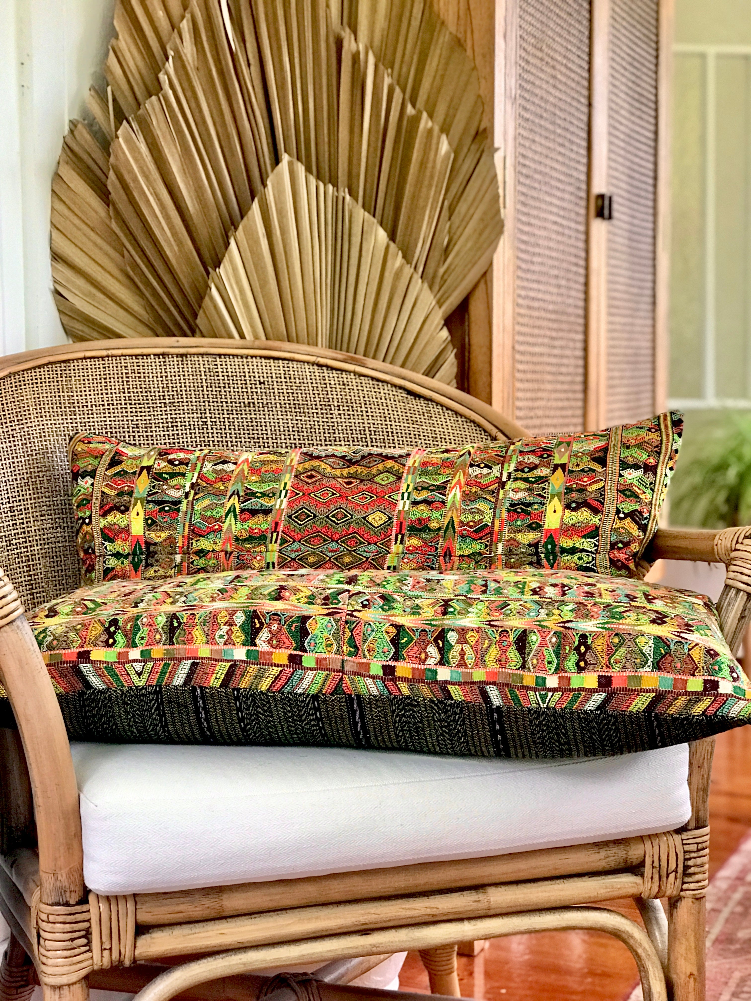 Vintage textile cushions made from a Guatemalan huipil and corte.