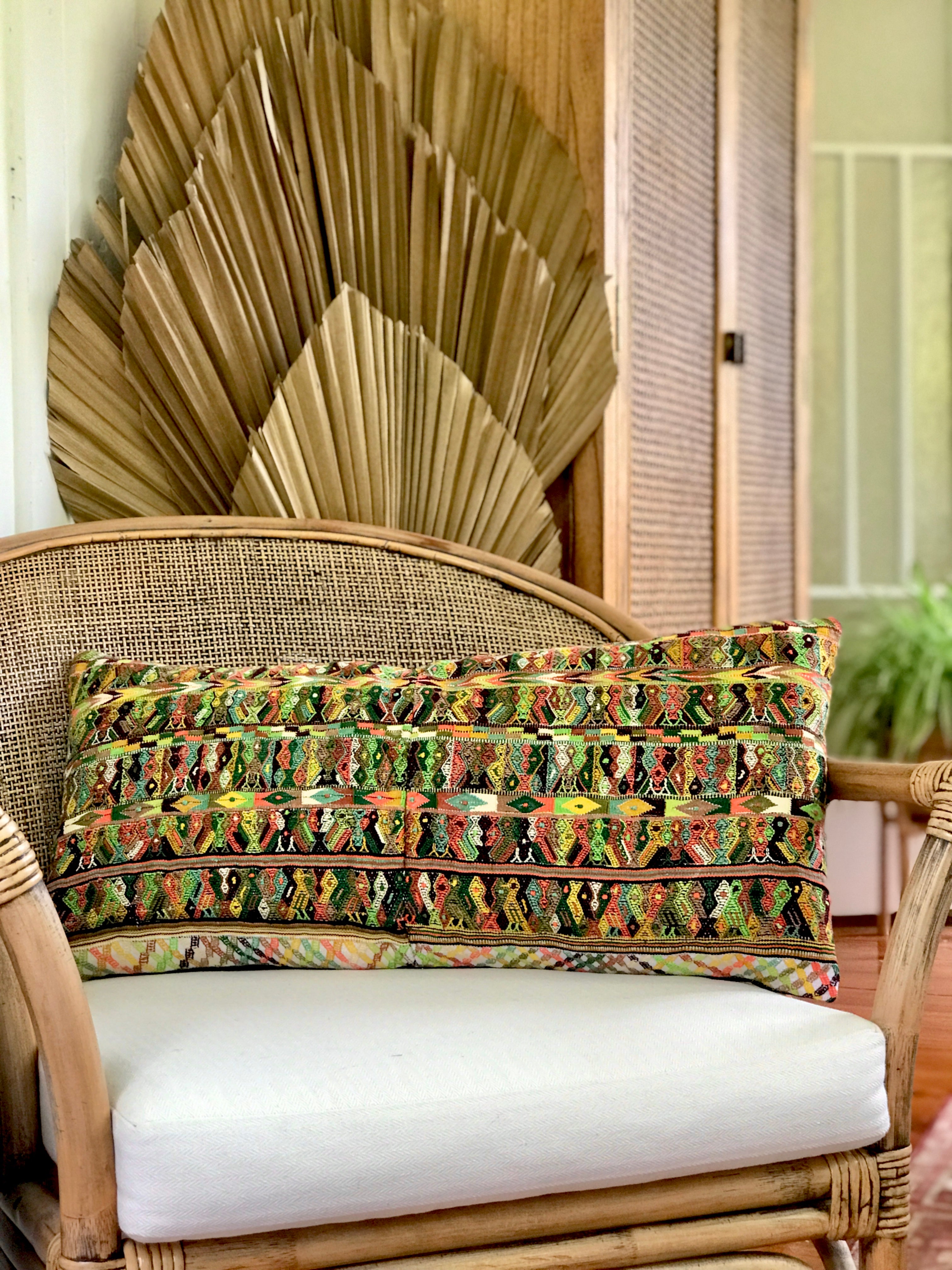Vintage textile cushions made from a Guatemalan huipil and corte.